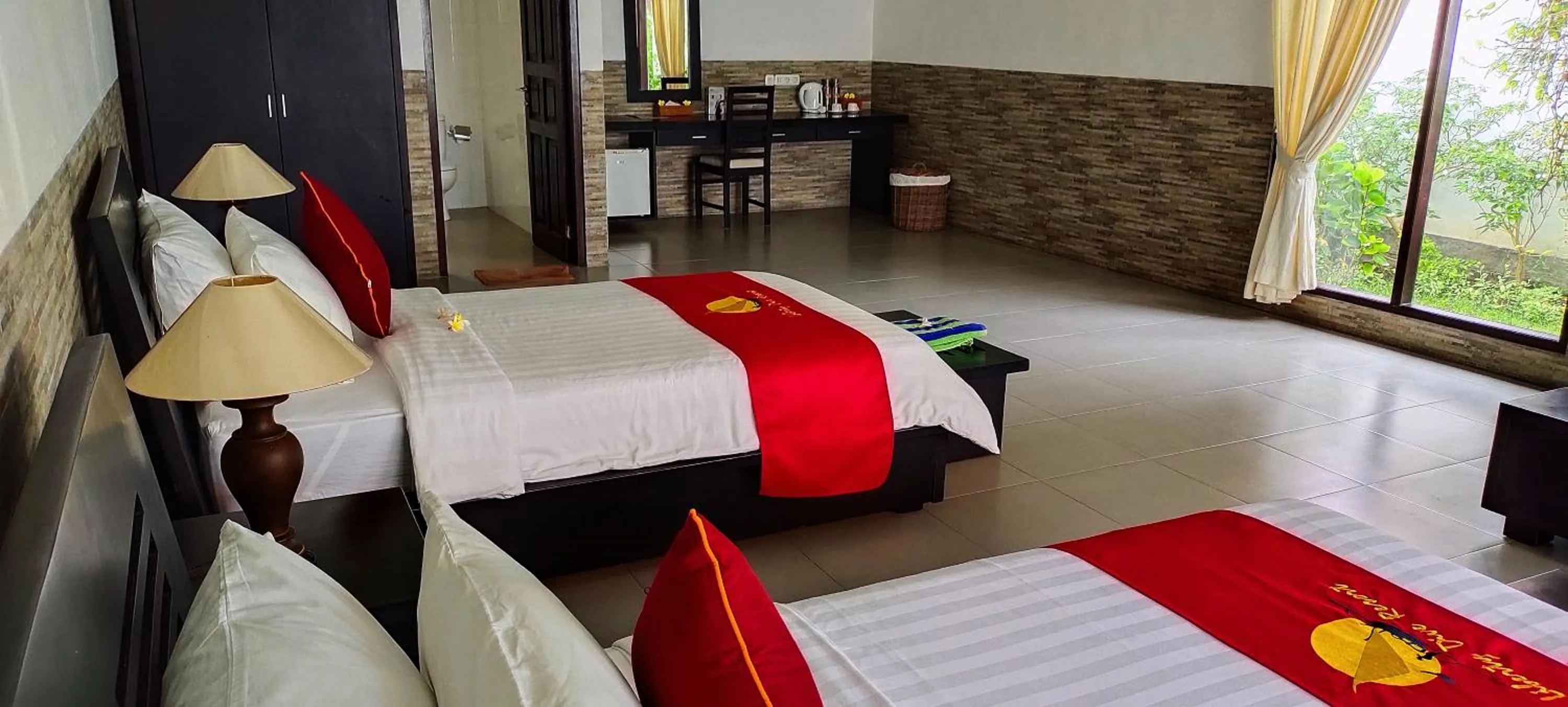 Bed in Liberty Dive Resort