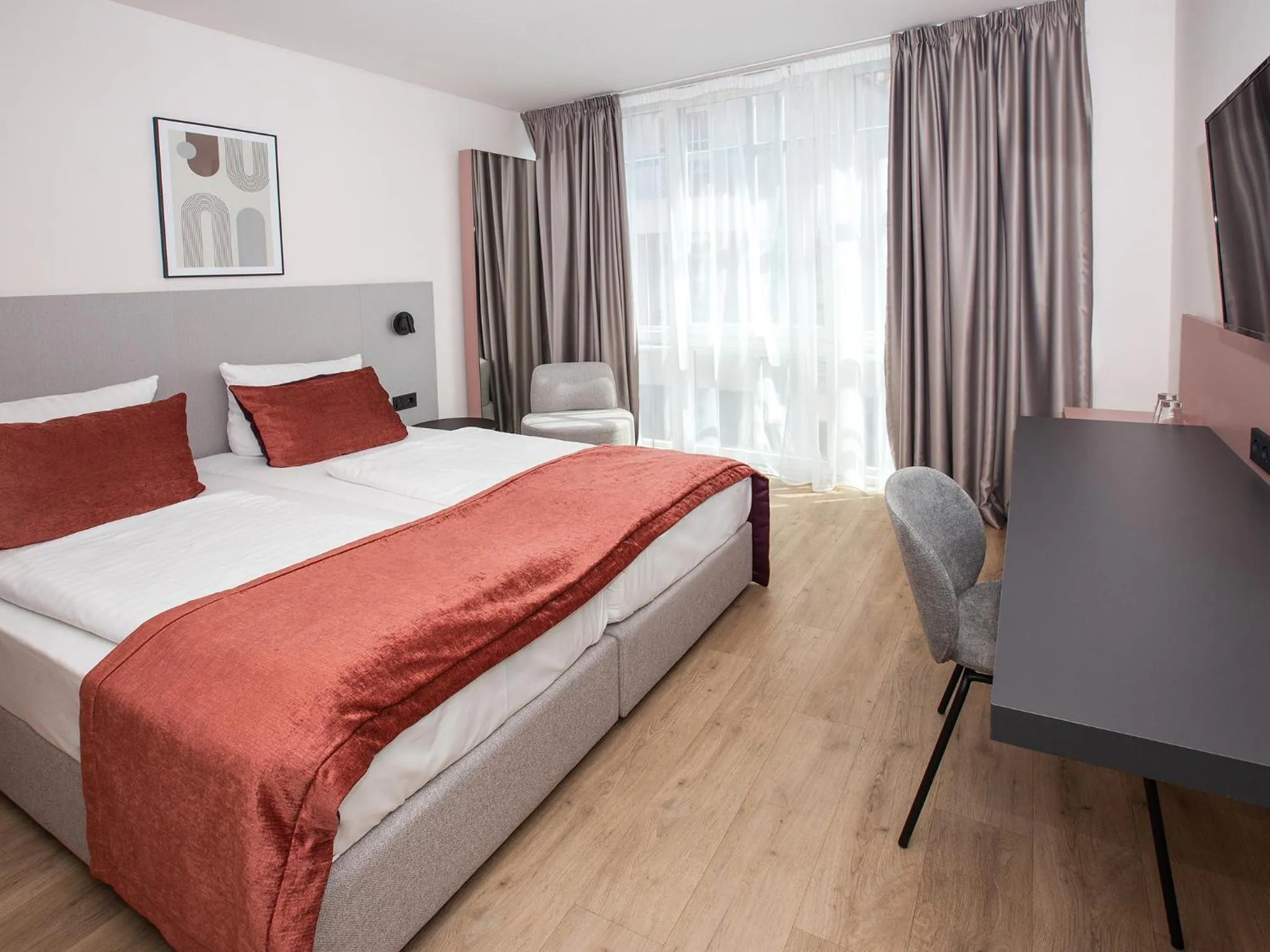 Photo of the whole room, Bed in DORMERO Hotel Bargenturm Lüneburg