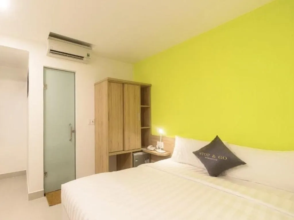 Bed in Stop and Go Boutique Homestay Hue