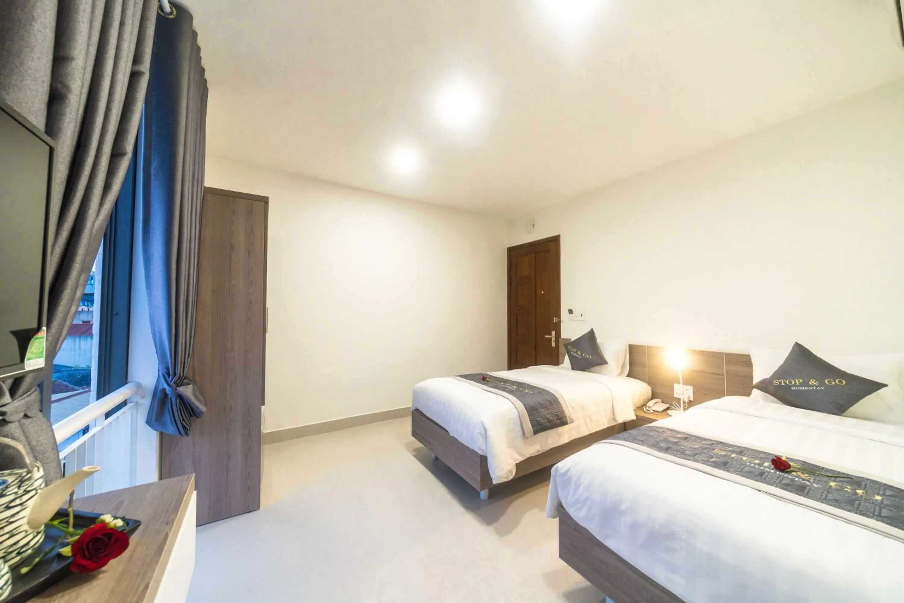 Bed in Stop and Go Boutique Homestay Hue