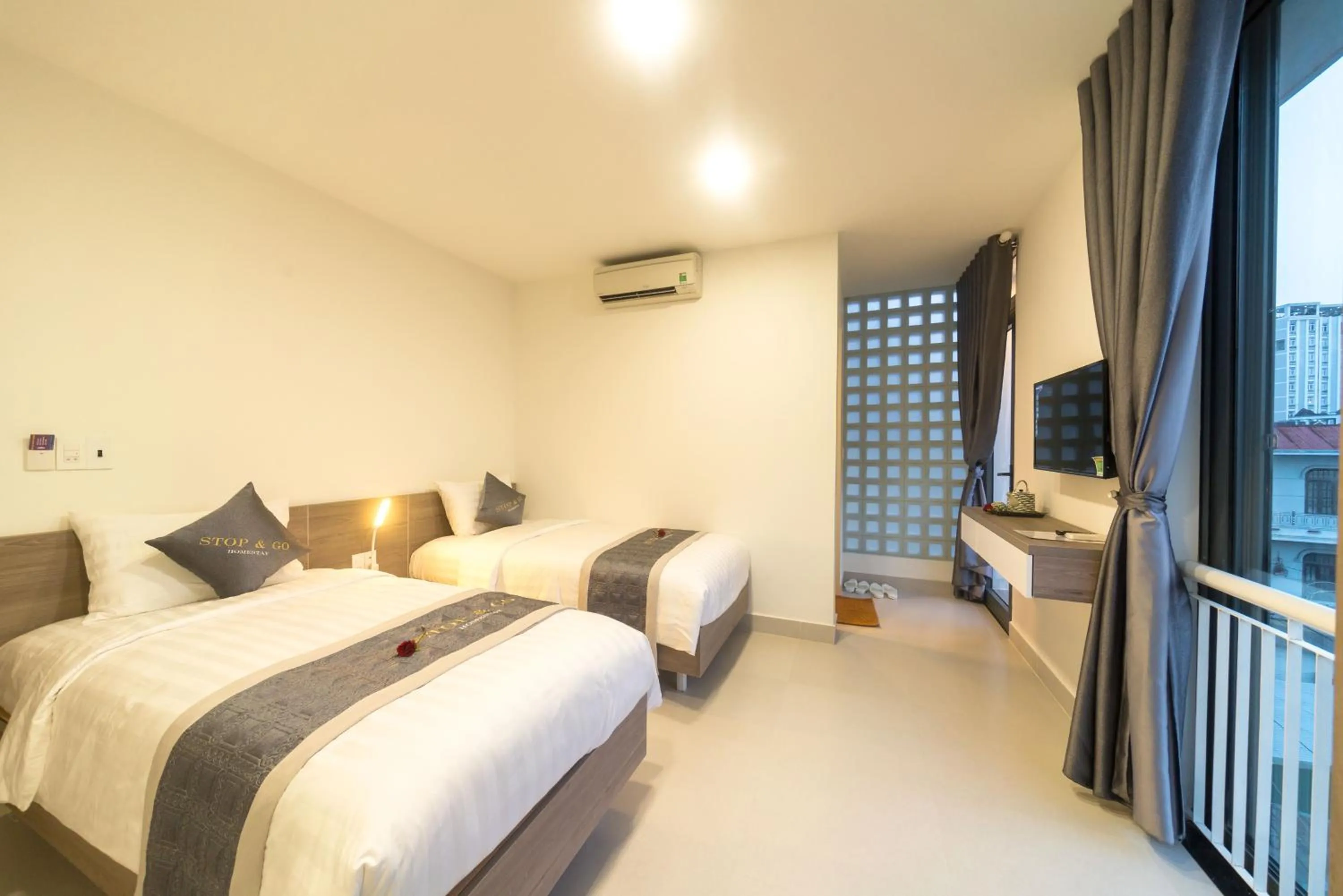 Bed in Stop and Go Boutique Homestay Hue