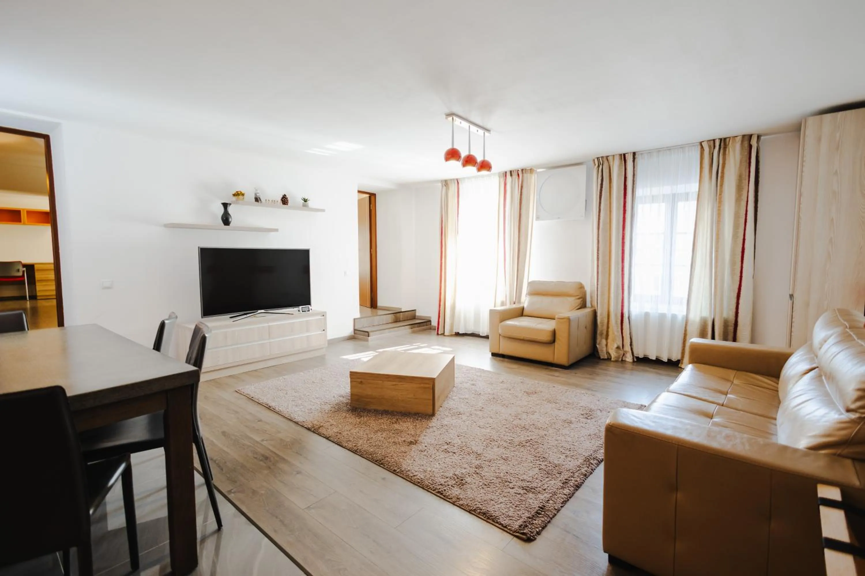 Communal lounge/ TV room in Casa Nicolae Luxury Suites