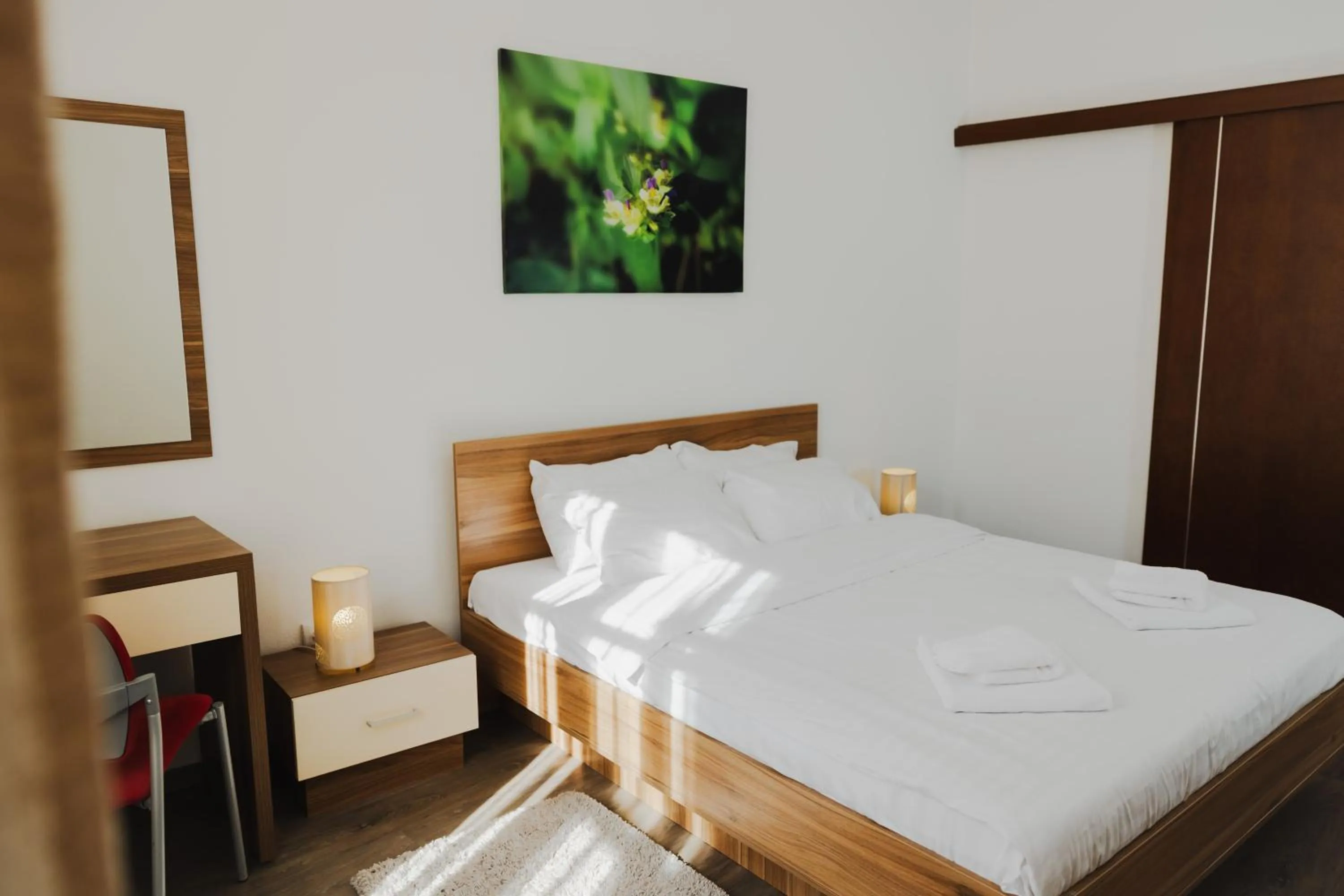 Bed in Casa Nicolae Luxury Suites