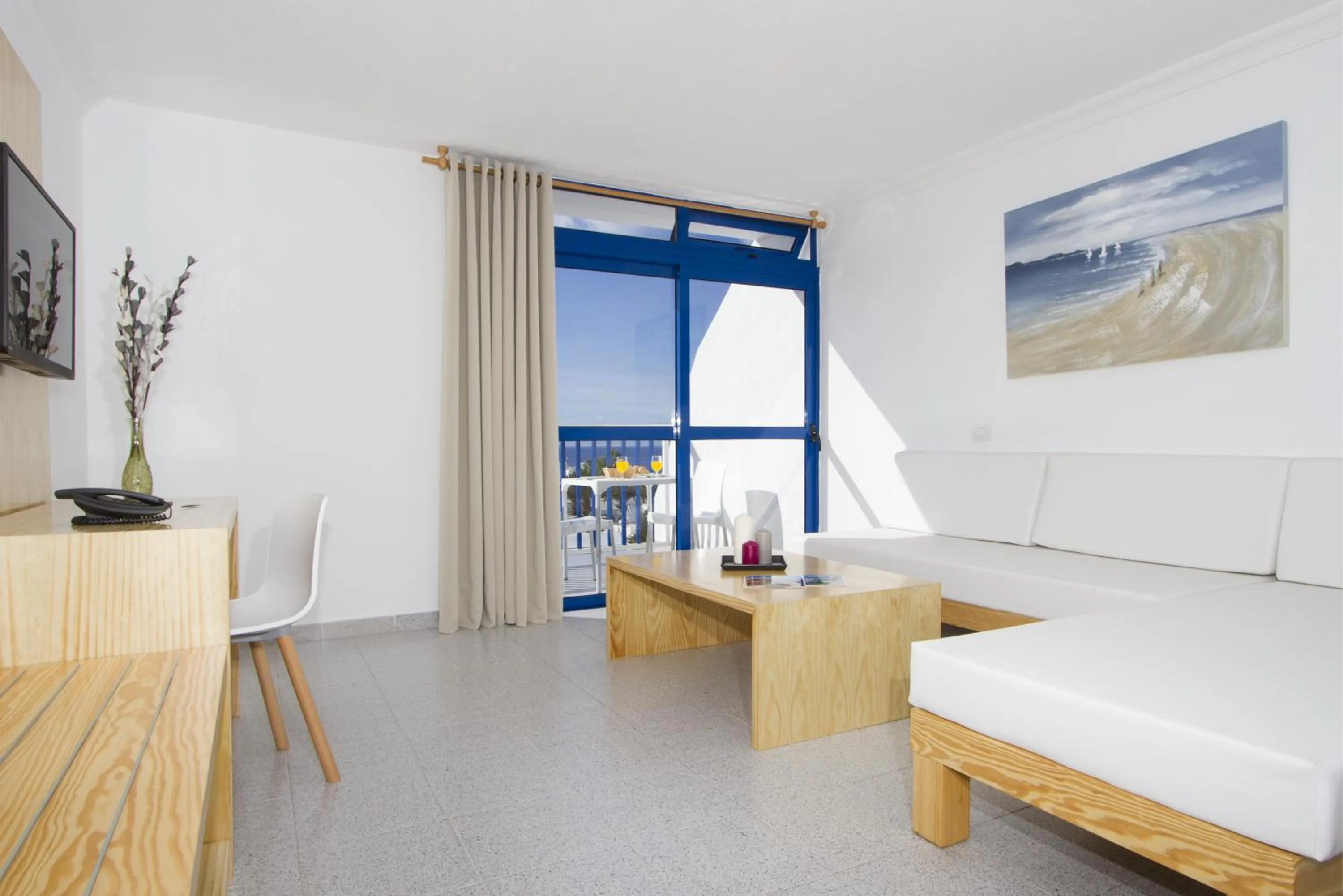 Living room, Bed in Ereza Apartamentos Los Hibiscos - Adults Only