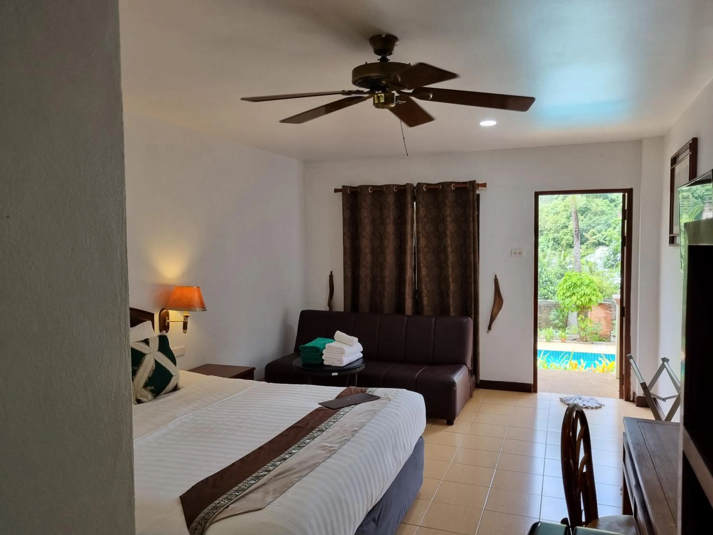 Living room, Bed in Kata Interhouse Resort by Haii Collection