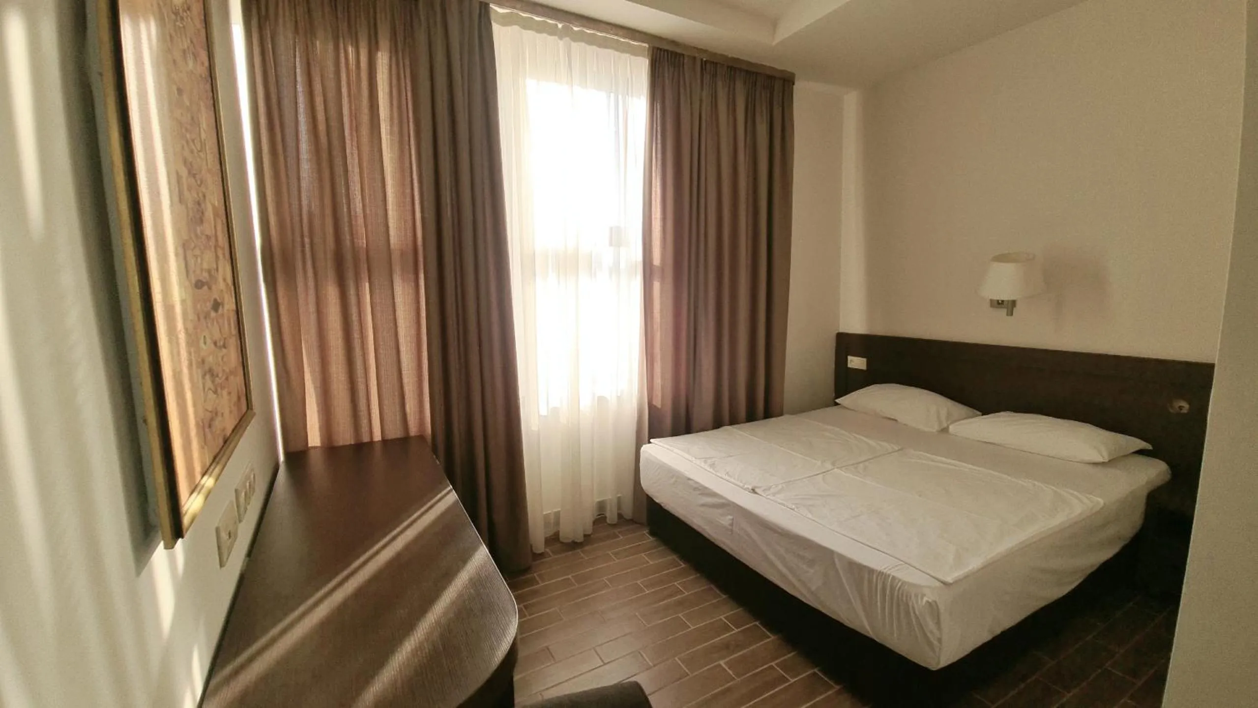 Bed in Yerevan Deluxe Hotel