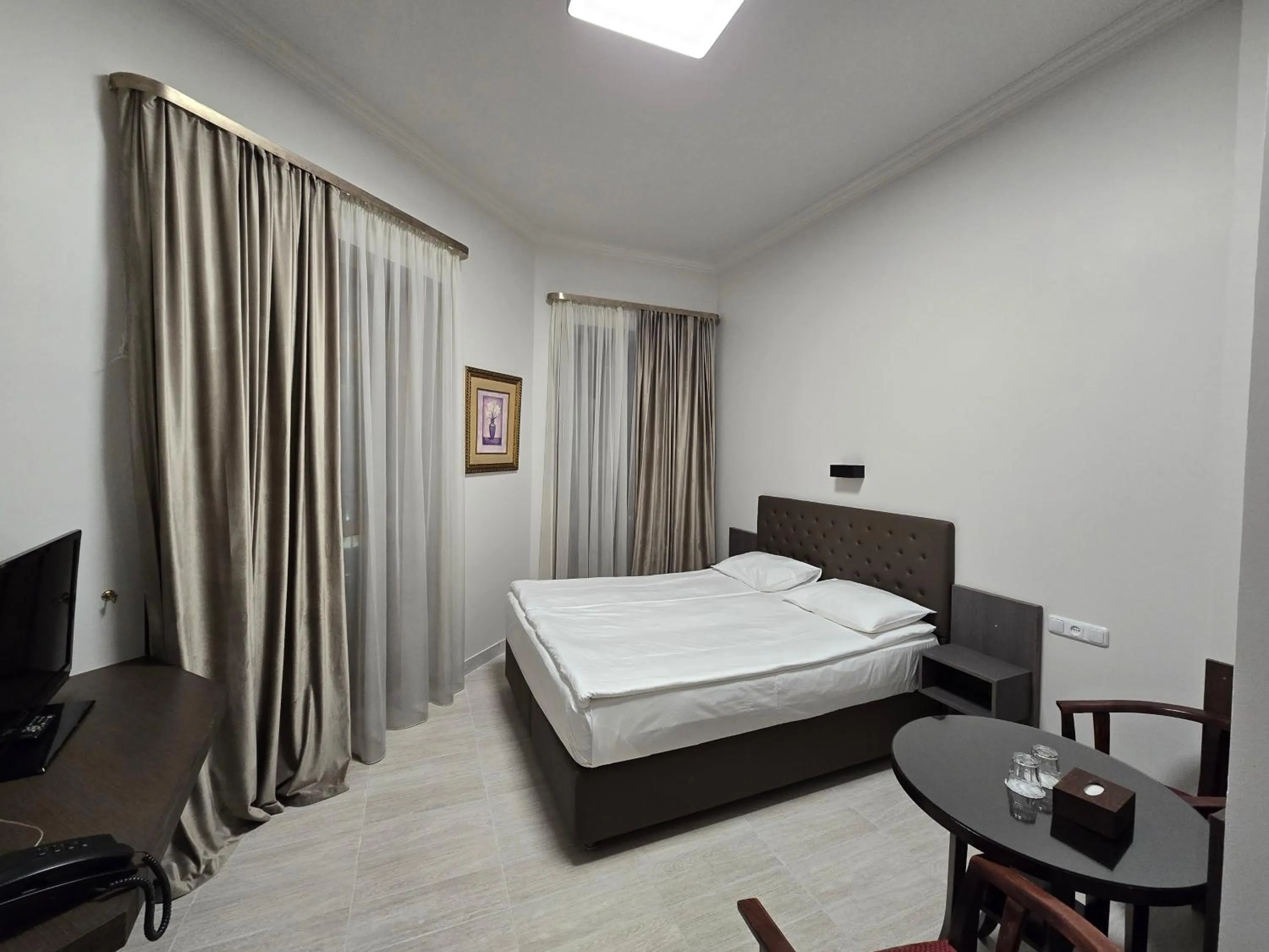 Bed in Yerevan Deluxe Hotel