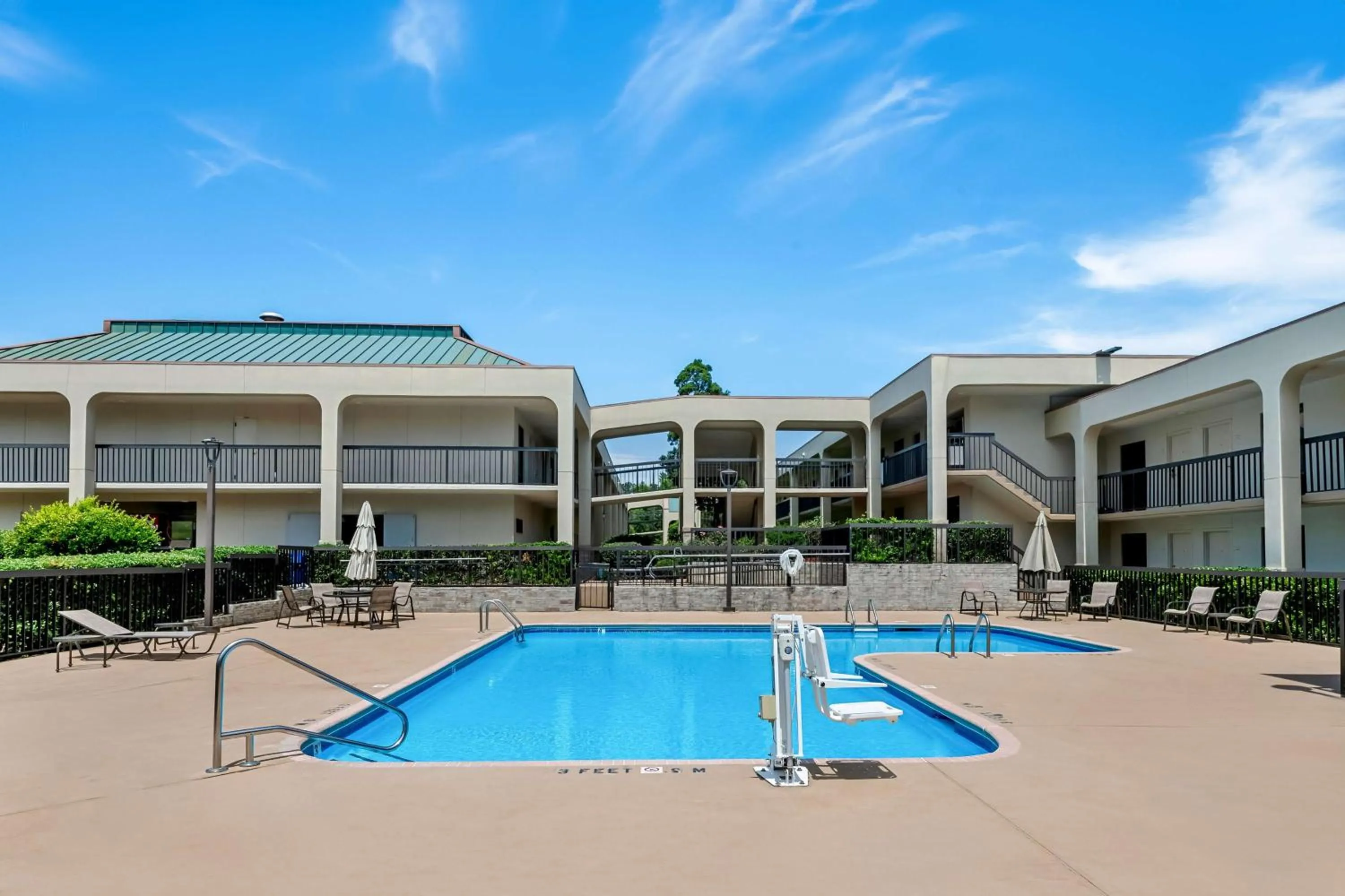 Pool view in SureStay Plus Hotel by Best Western Southern Pines Pinehurst