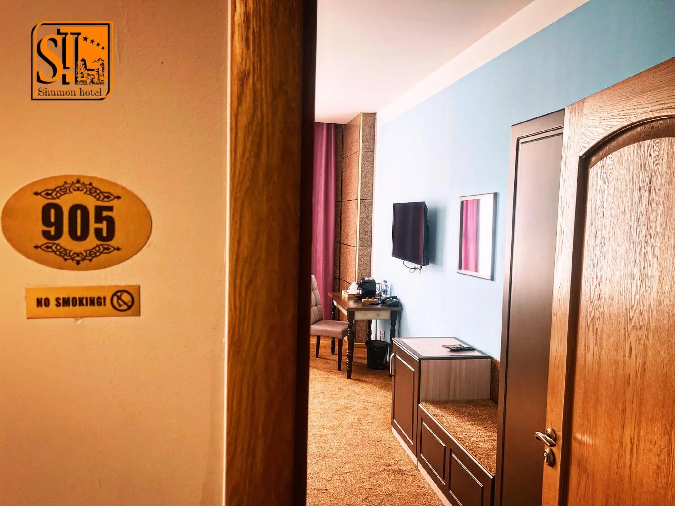 Property logo or sign in Hotel Shumon