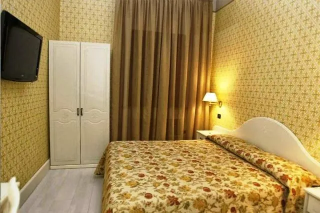 Photo of the whole room, Bed in Palazzo Riario