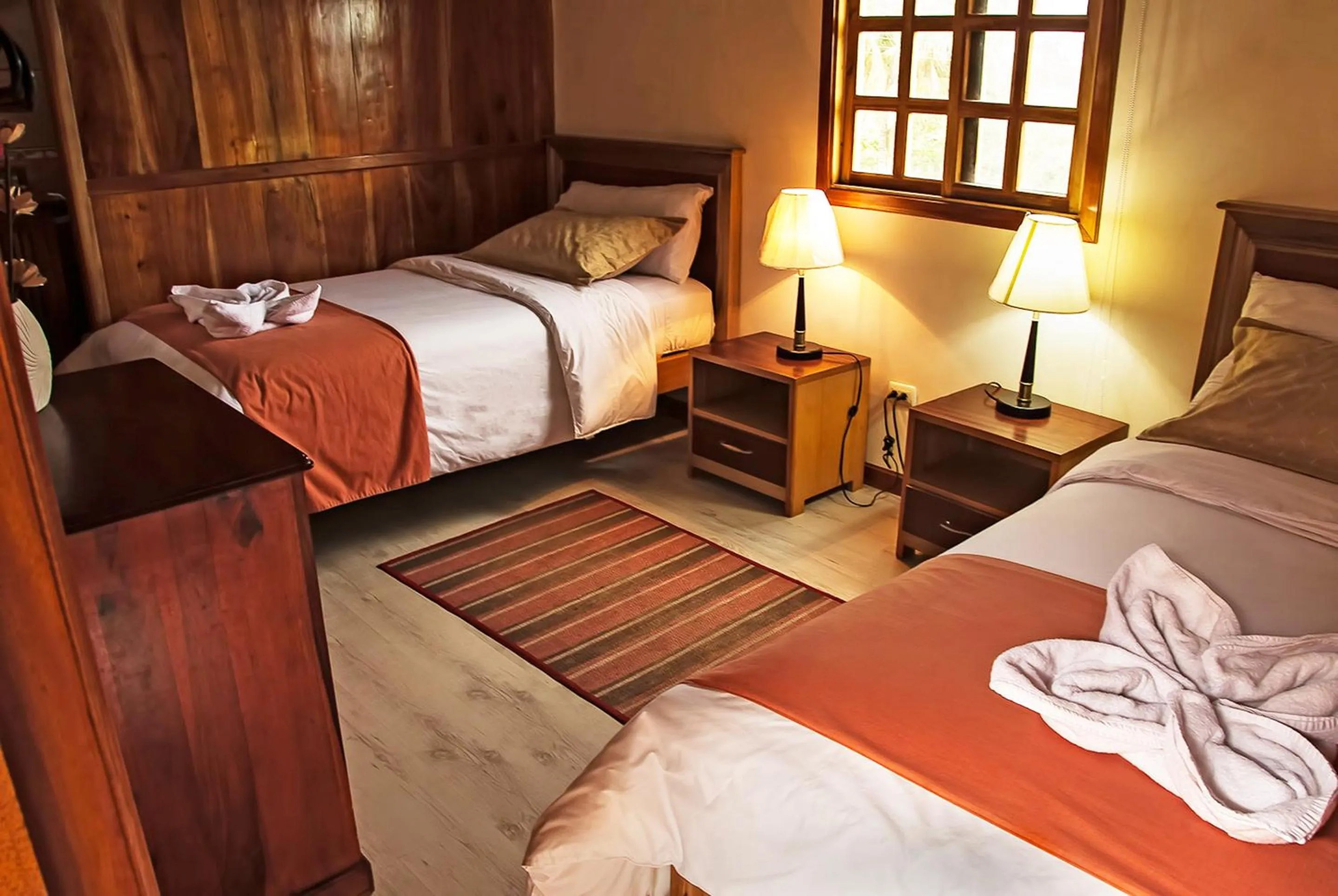 Bed in The Wooden House Hotel