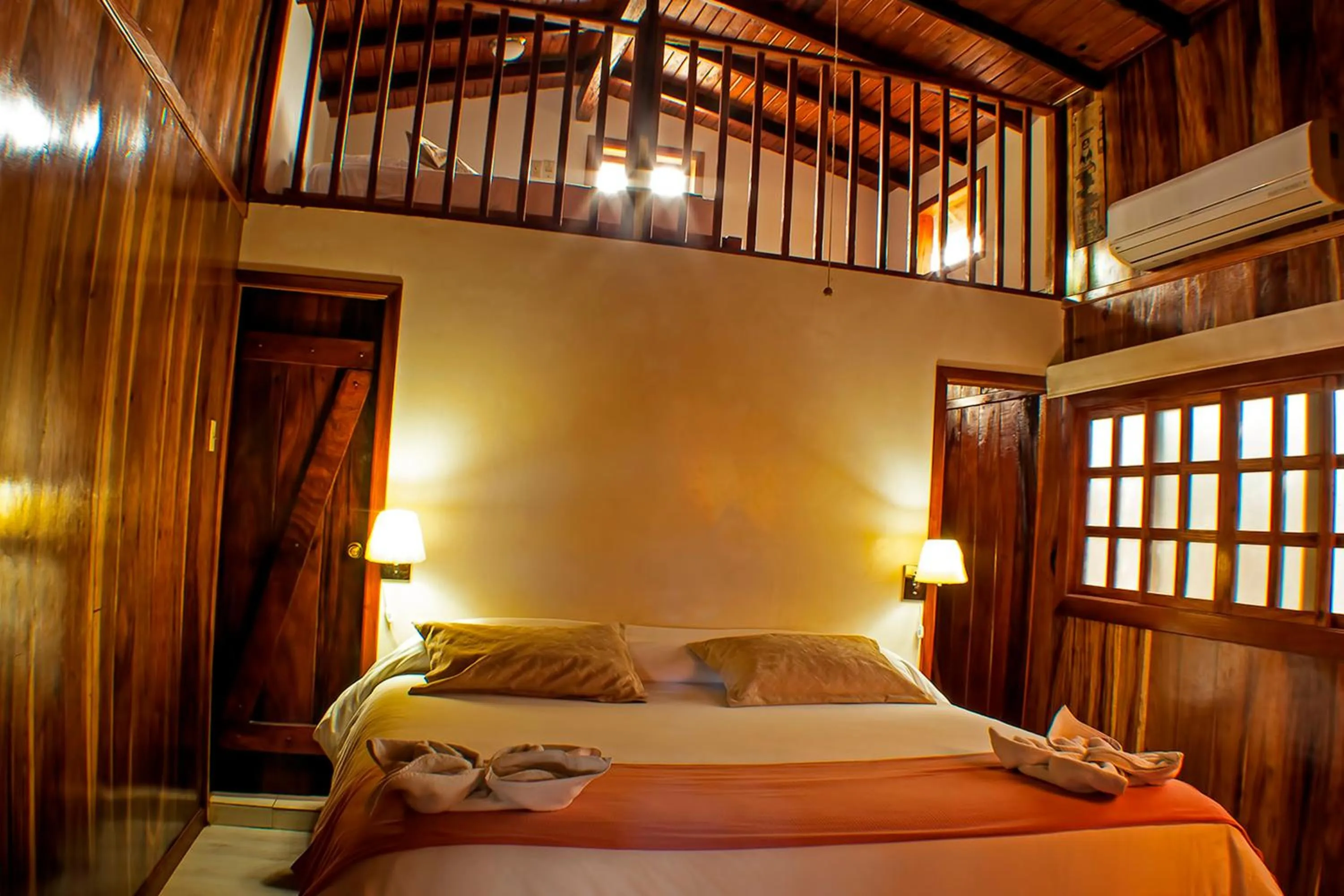 Bed in The Wooden House Hotel