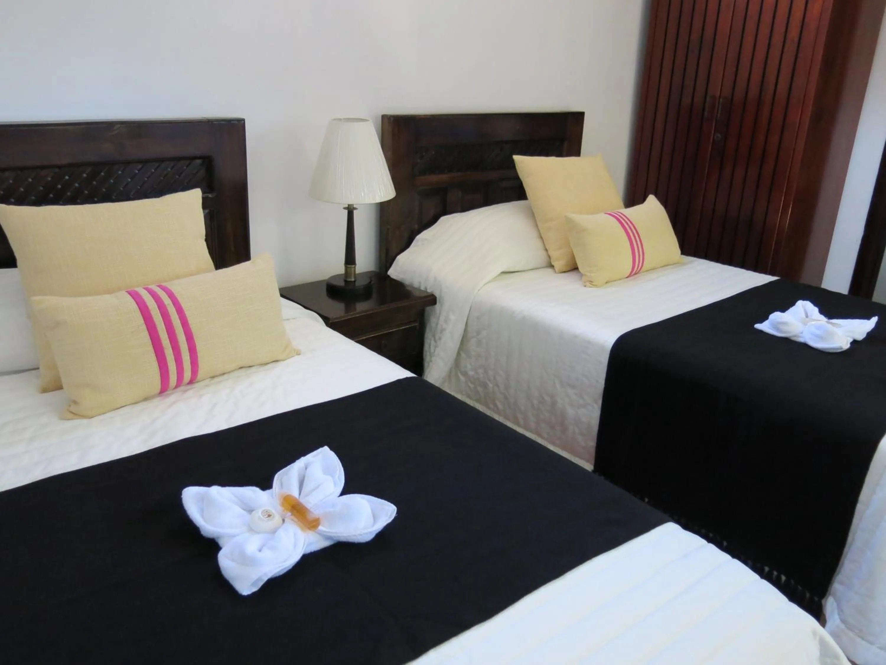 Bed in The Wooden House Hotel