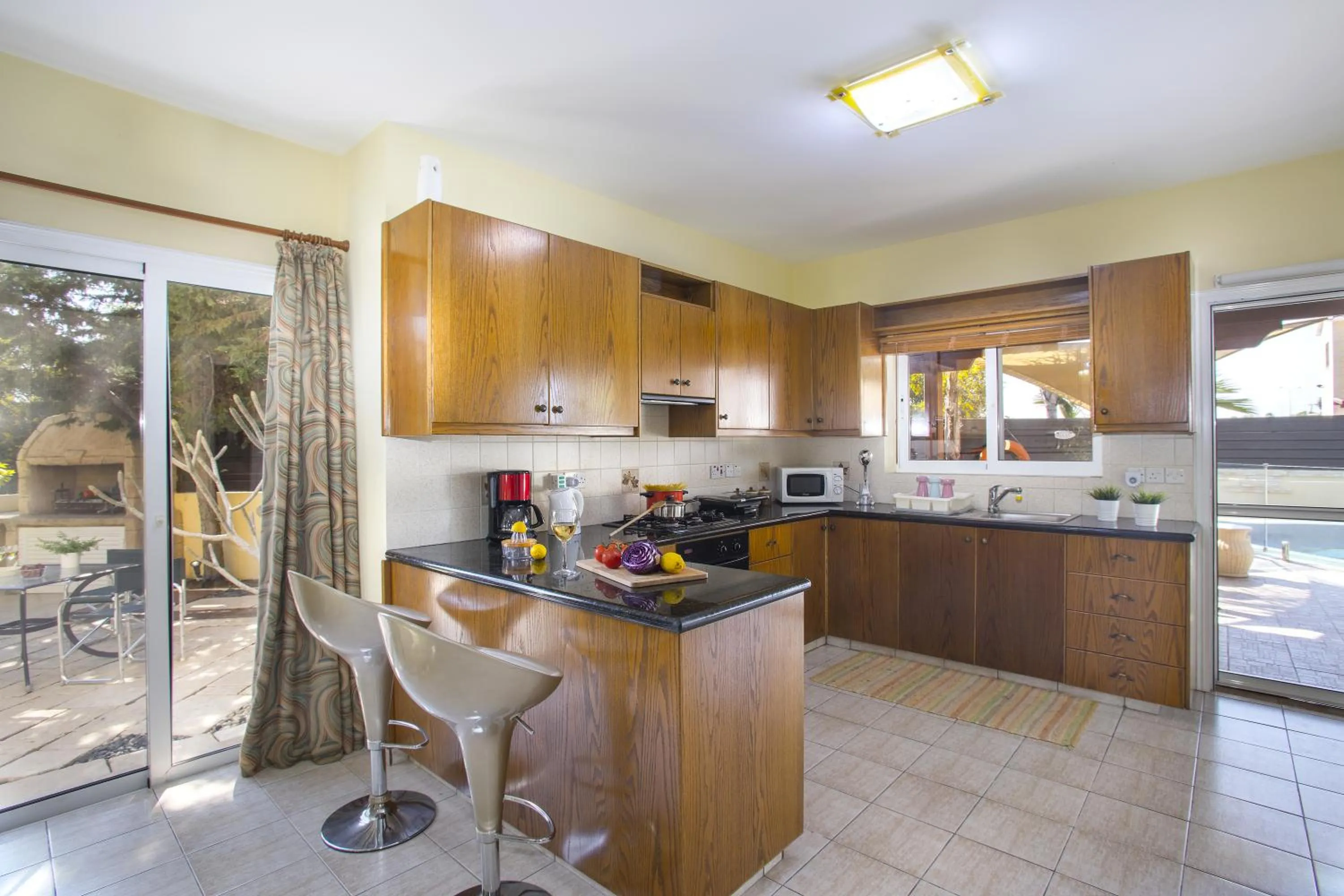 Kitchen or kitchenette in Ayia Napa Tropical Beach Villa