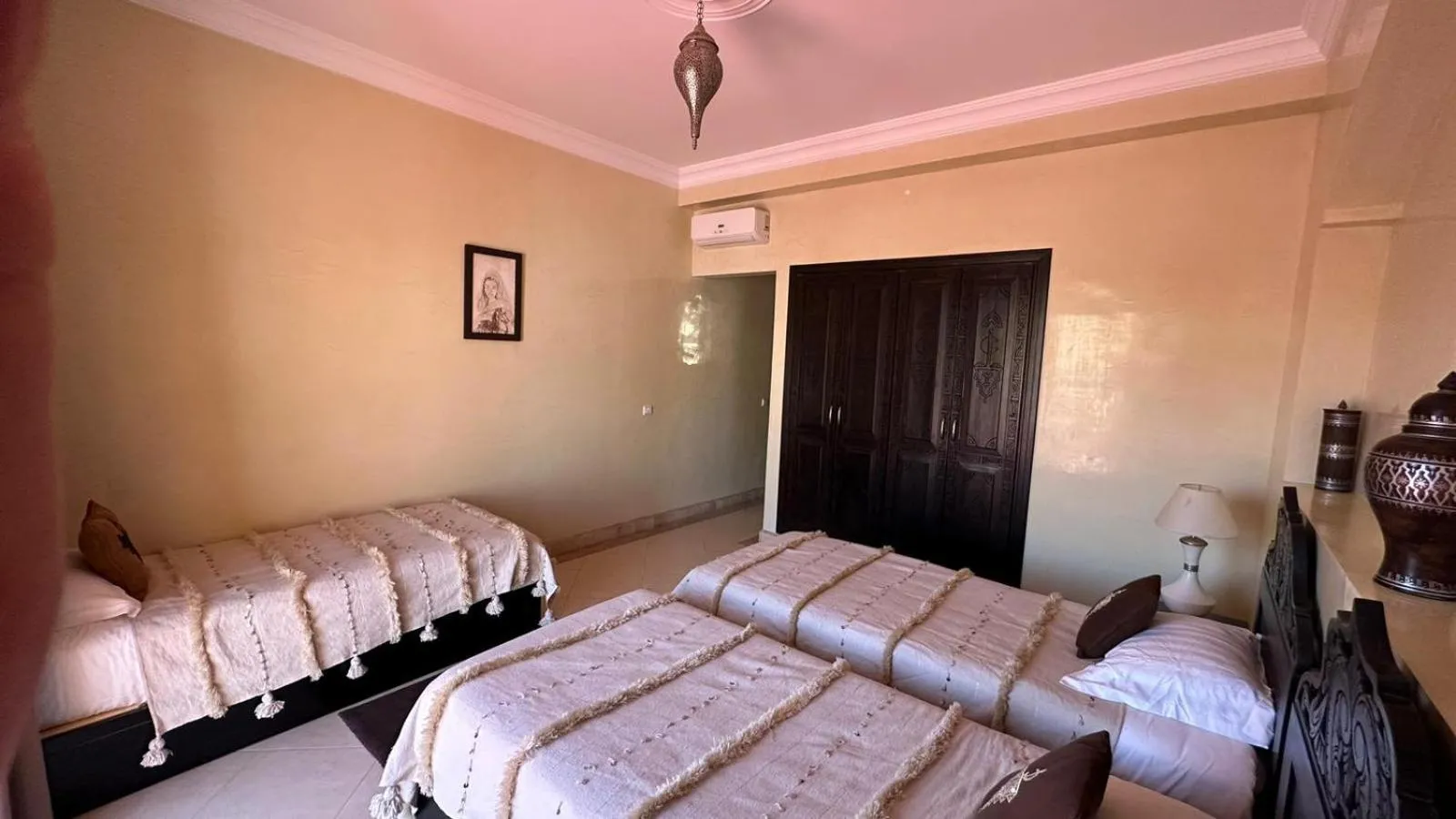 Bed in Riad Asmaa Agadir
