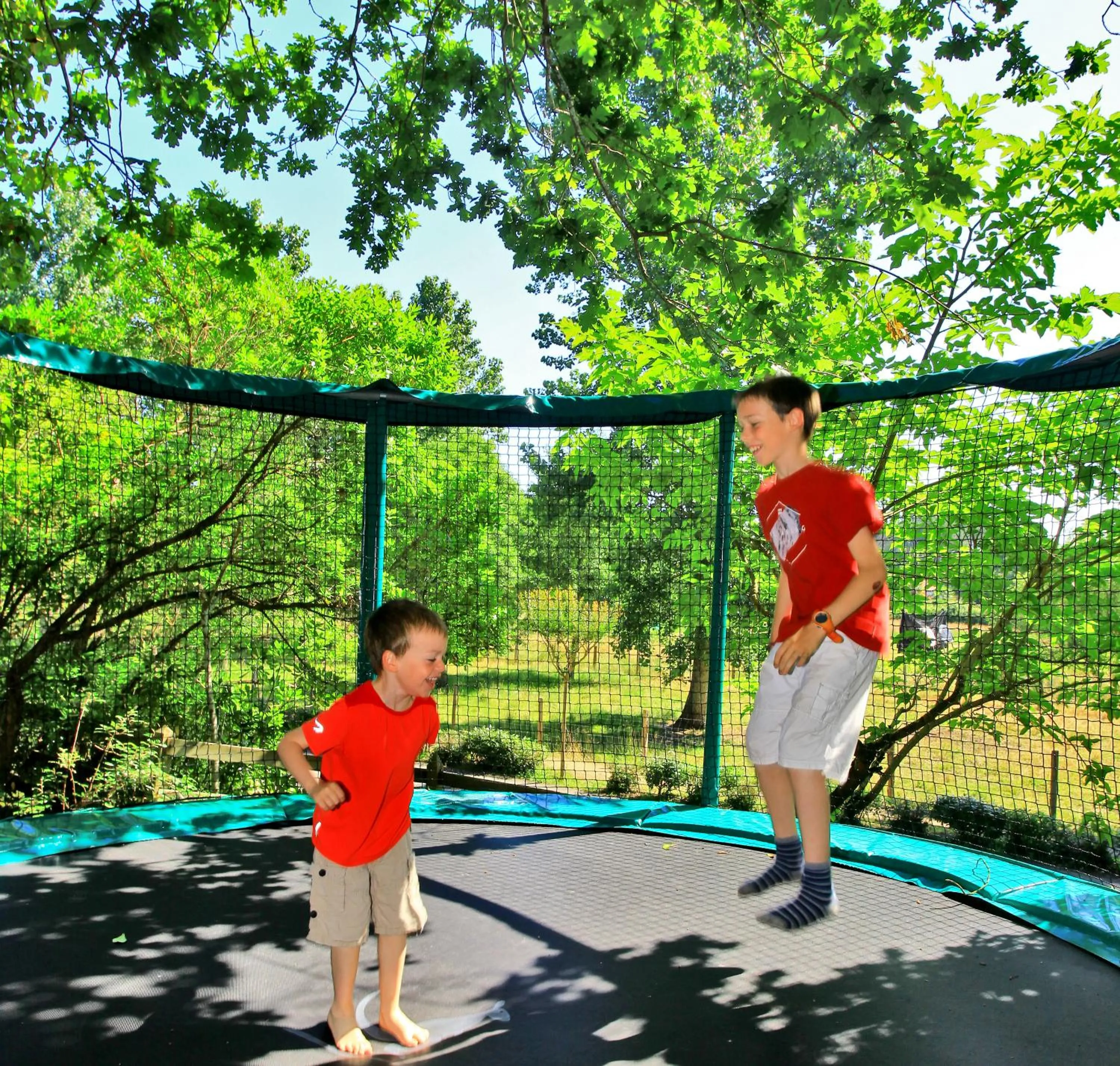 children in Village Nature et Océan à côté de la plage avec piscine et jacuzzi