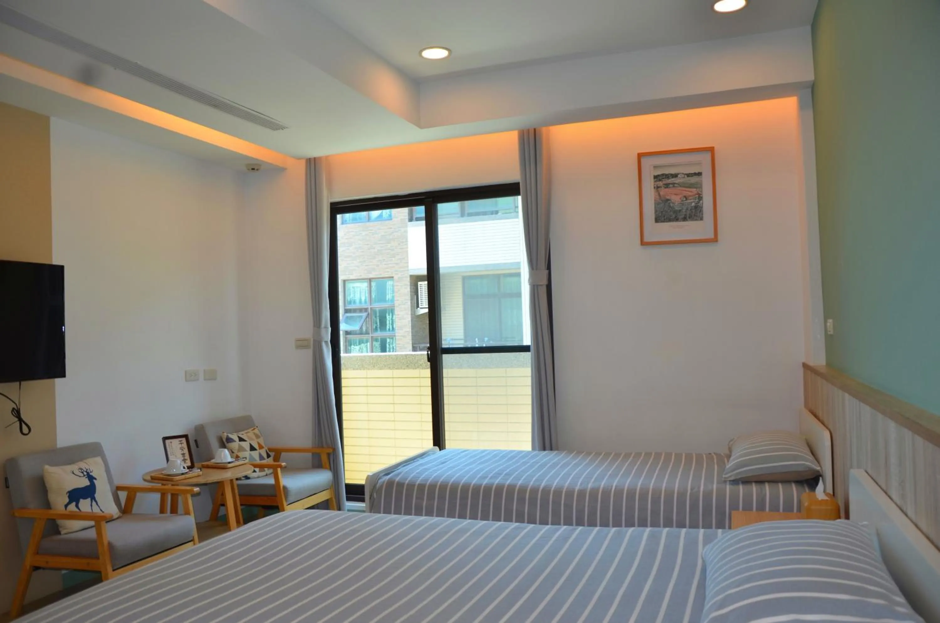 TV and multimedia, Bed in Blowing in the wind Homestay