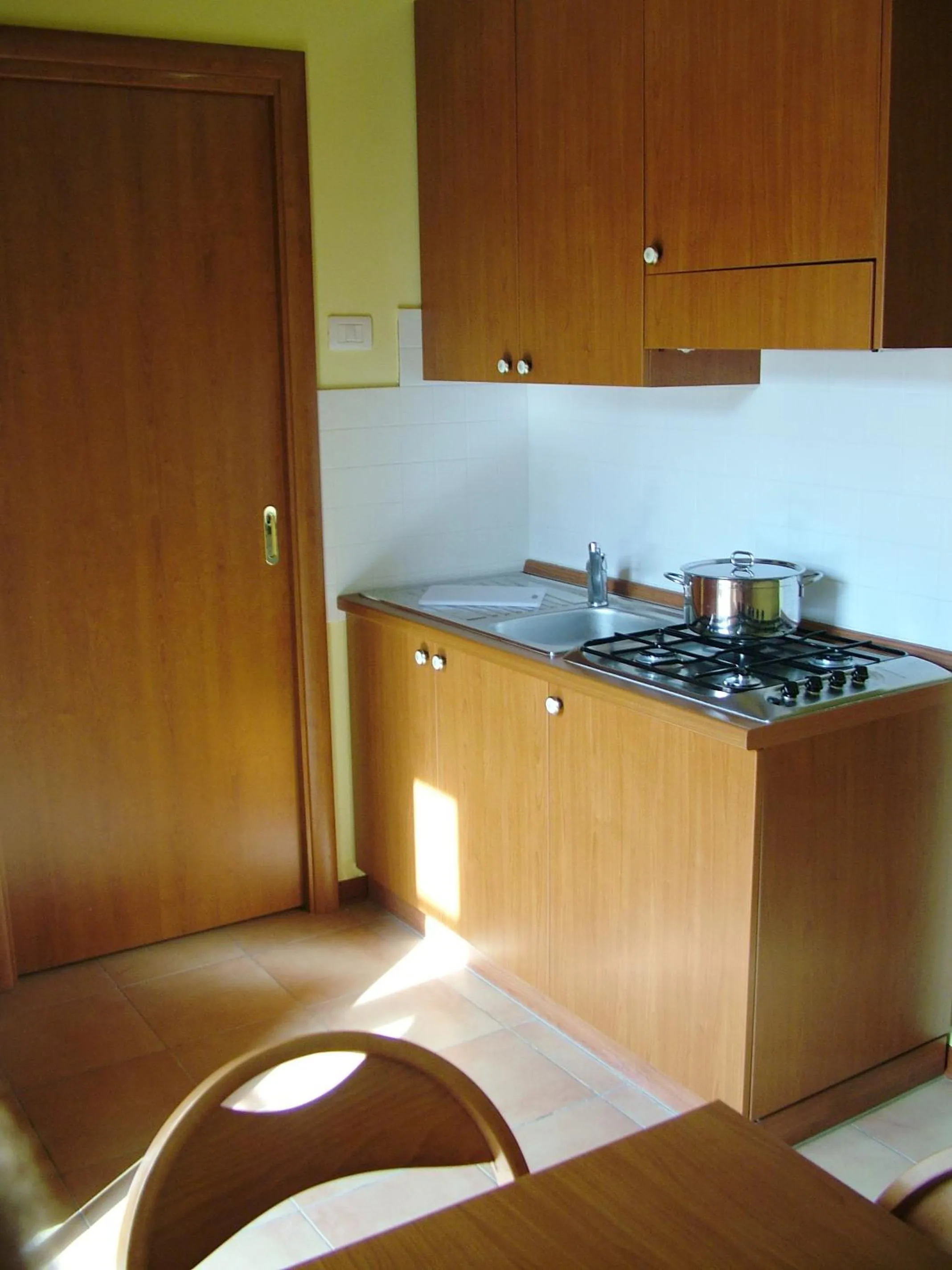 Kitchen or kitchenette in Residenza Mediterranea