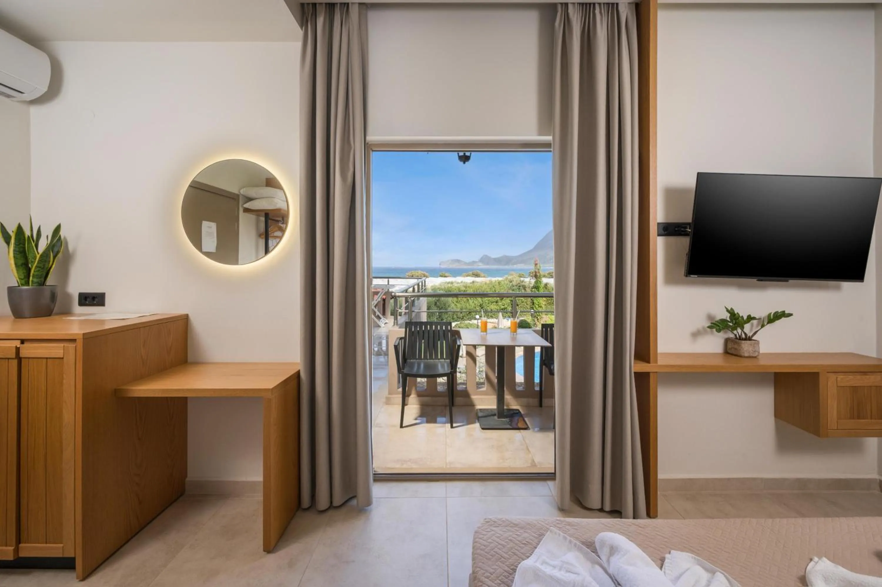 Bed in Petritos Rooms and Studios