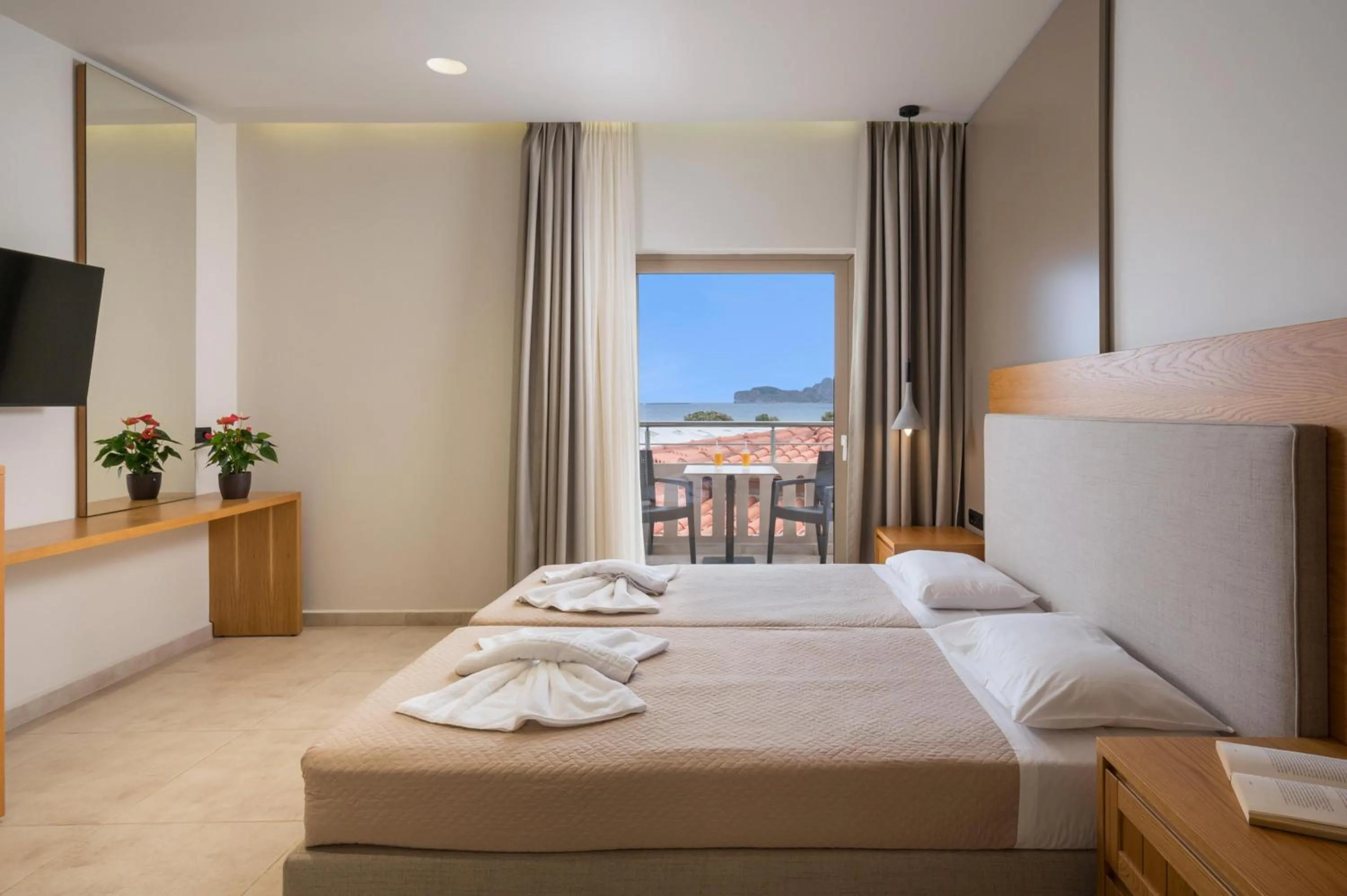 Bed in Petritos Rooms and Studios