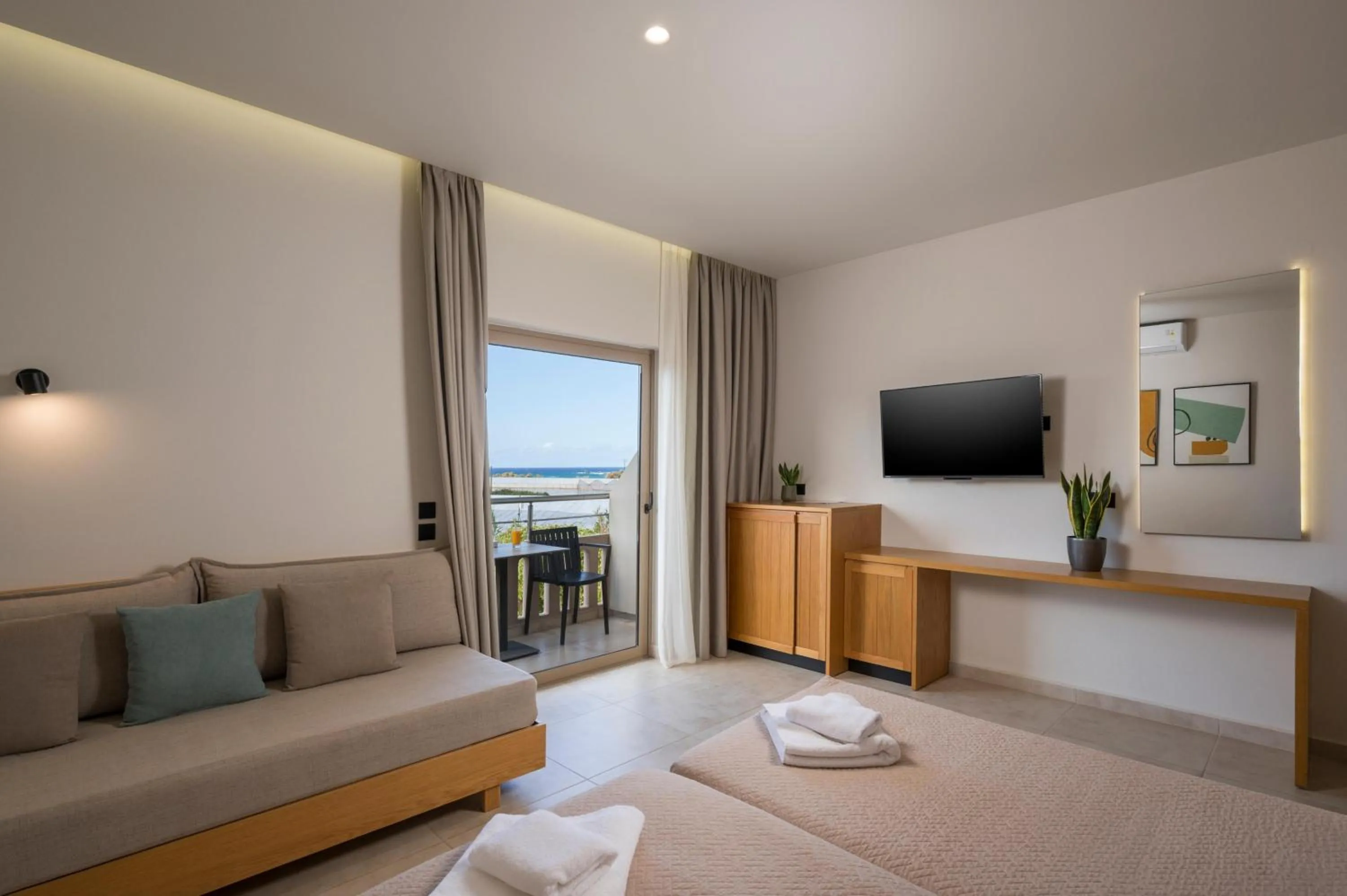 Bed in Petritos Rooms and Studios