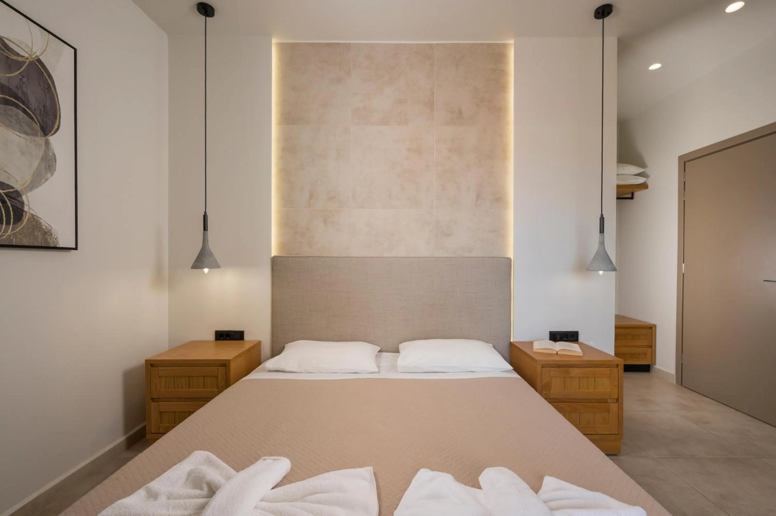 Bed in Petritos Rooms and Studios