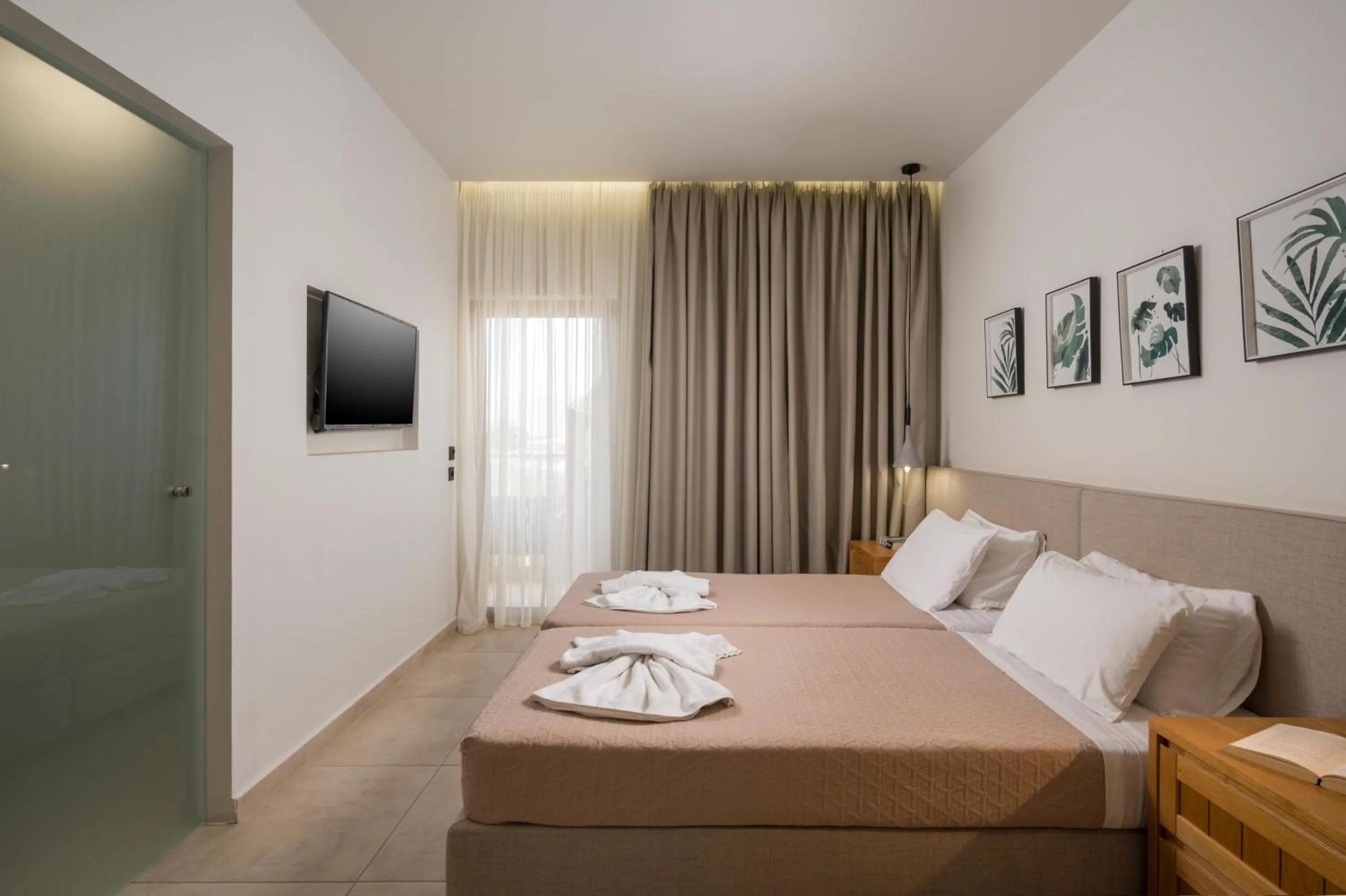 Bed in Petritos Rooms and Studios