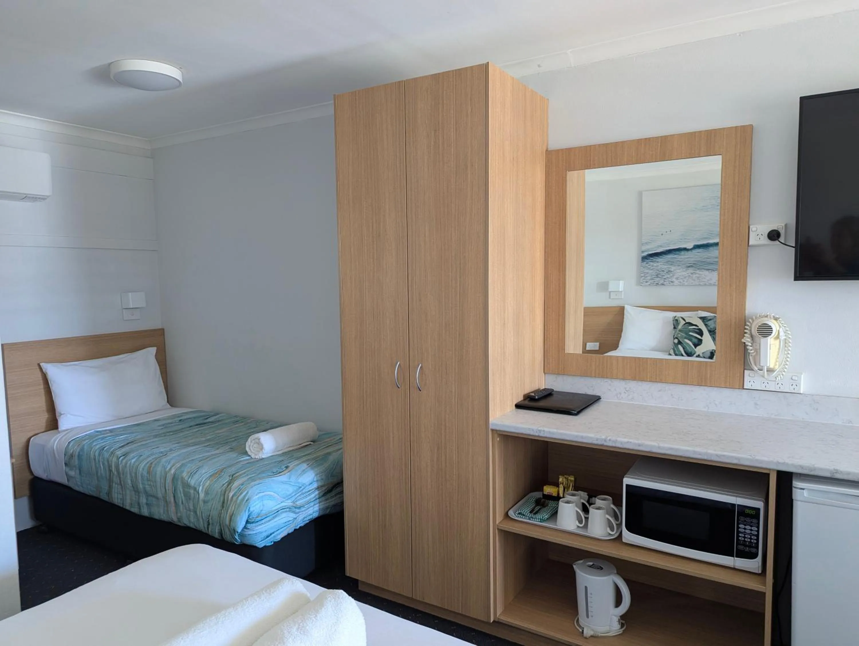 Bed in Araluen Motor Lodge