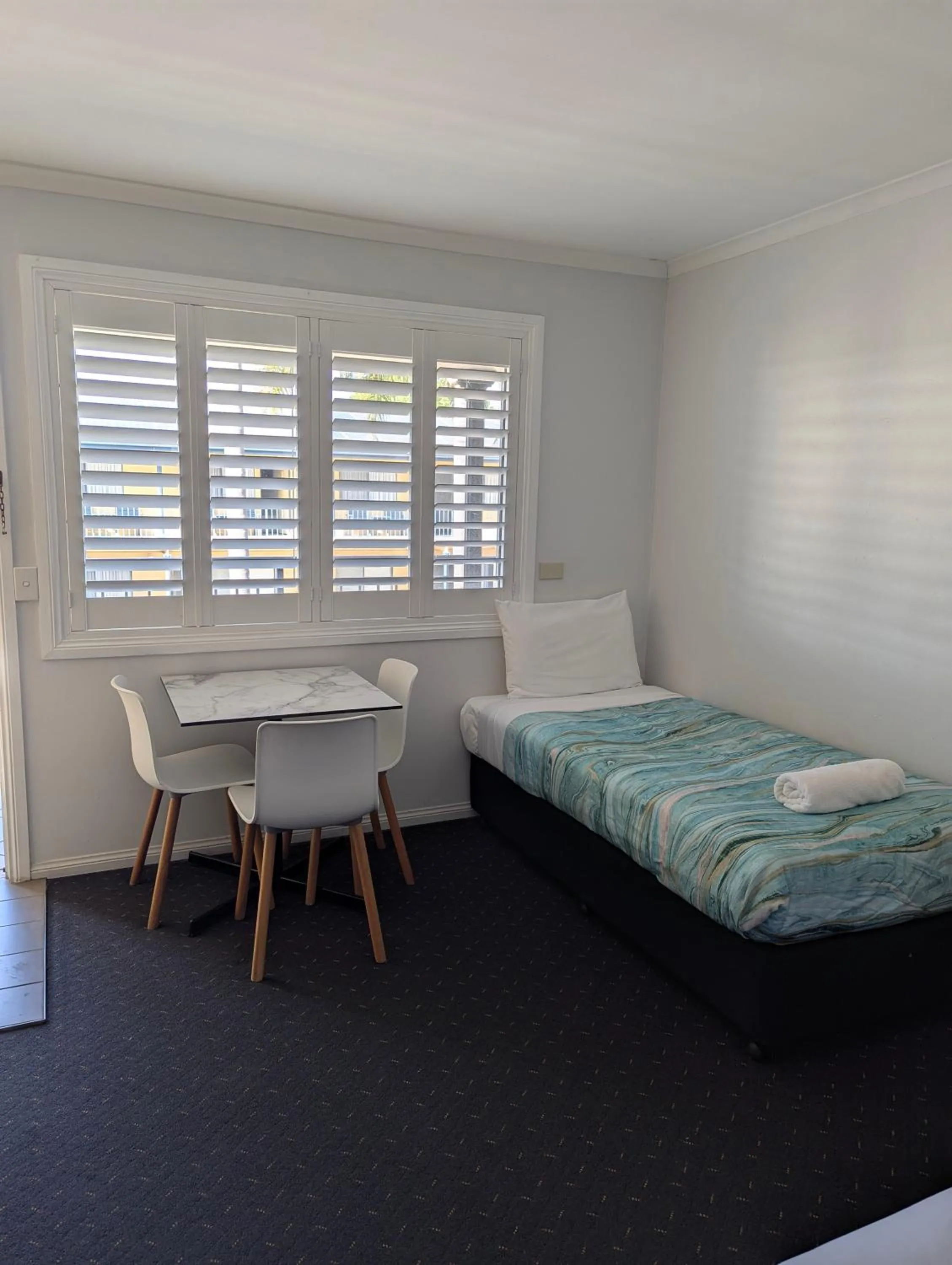 Bed in Araluen Motor Lodge