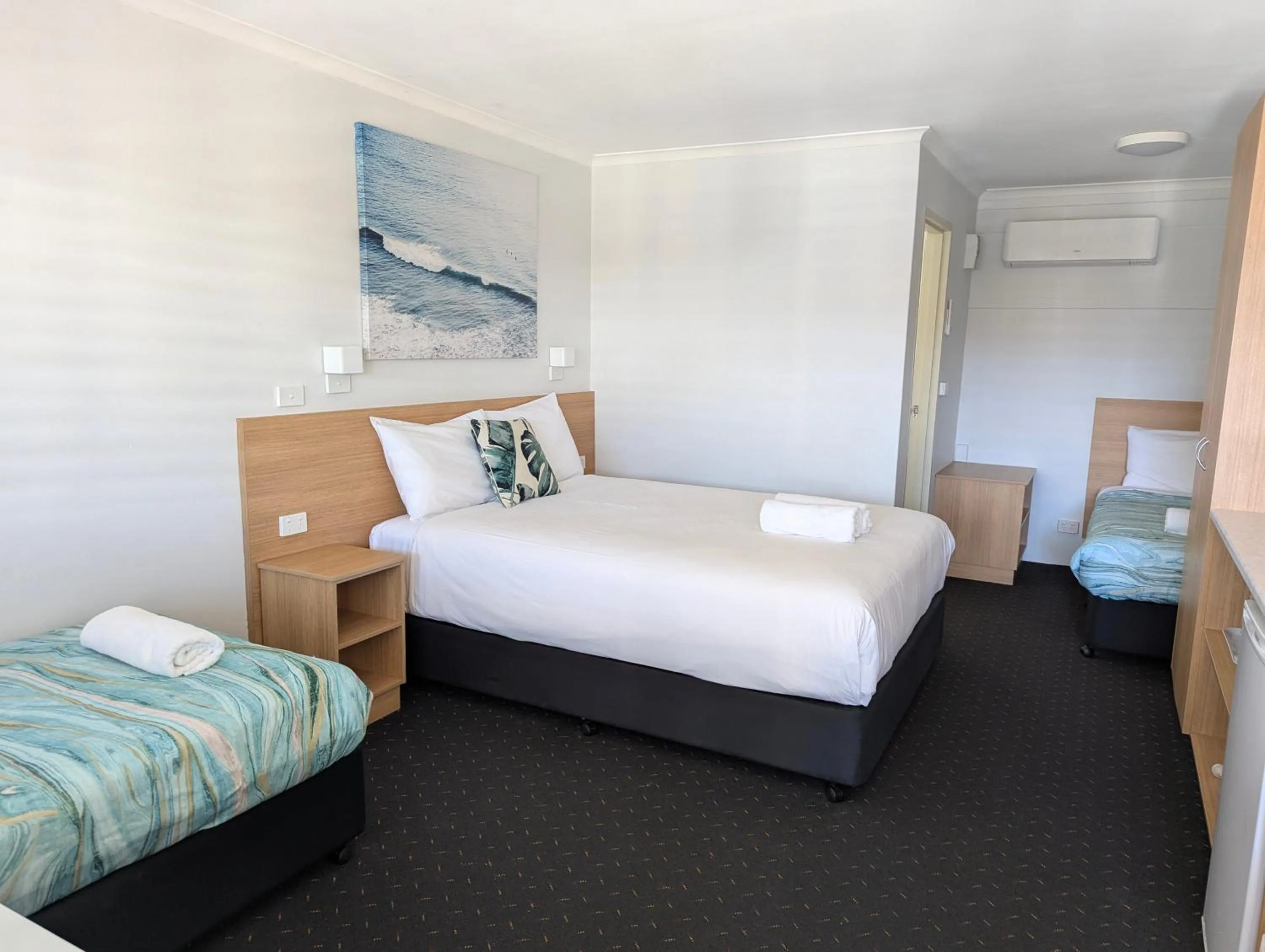 Bed in Araluen Motor Lodge