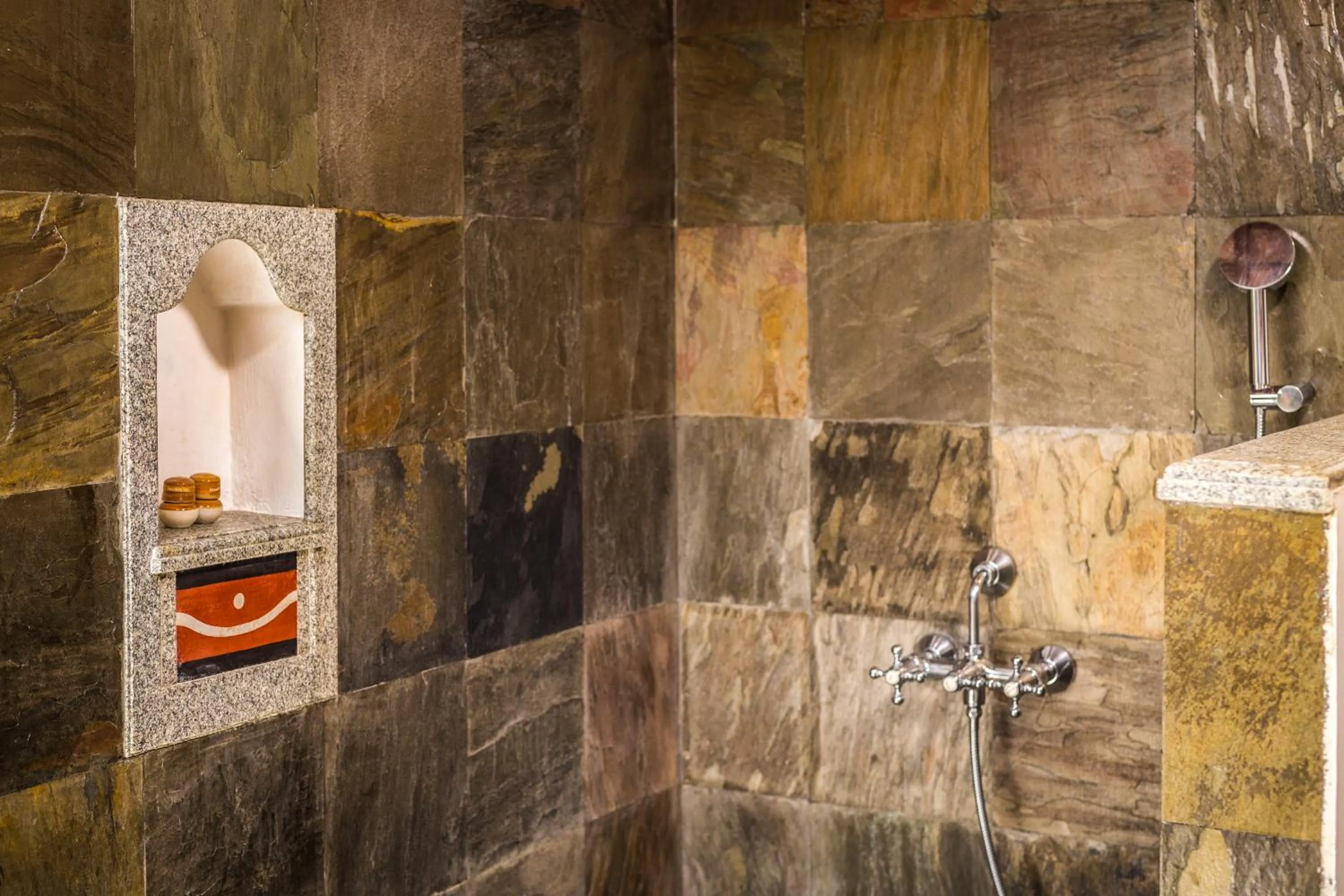 Shower in Mantra Koodam Kumbakonam - A CGH Earth Experience