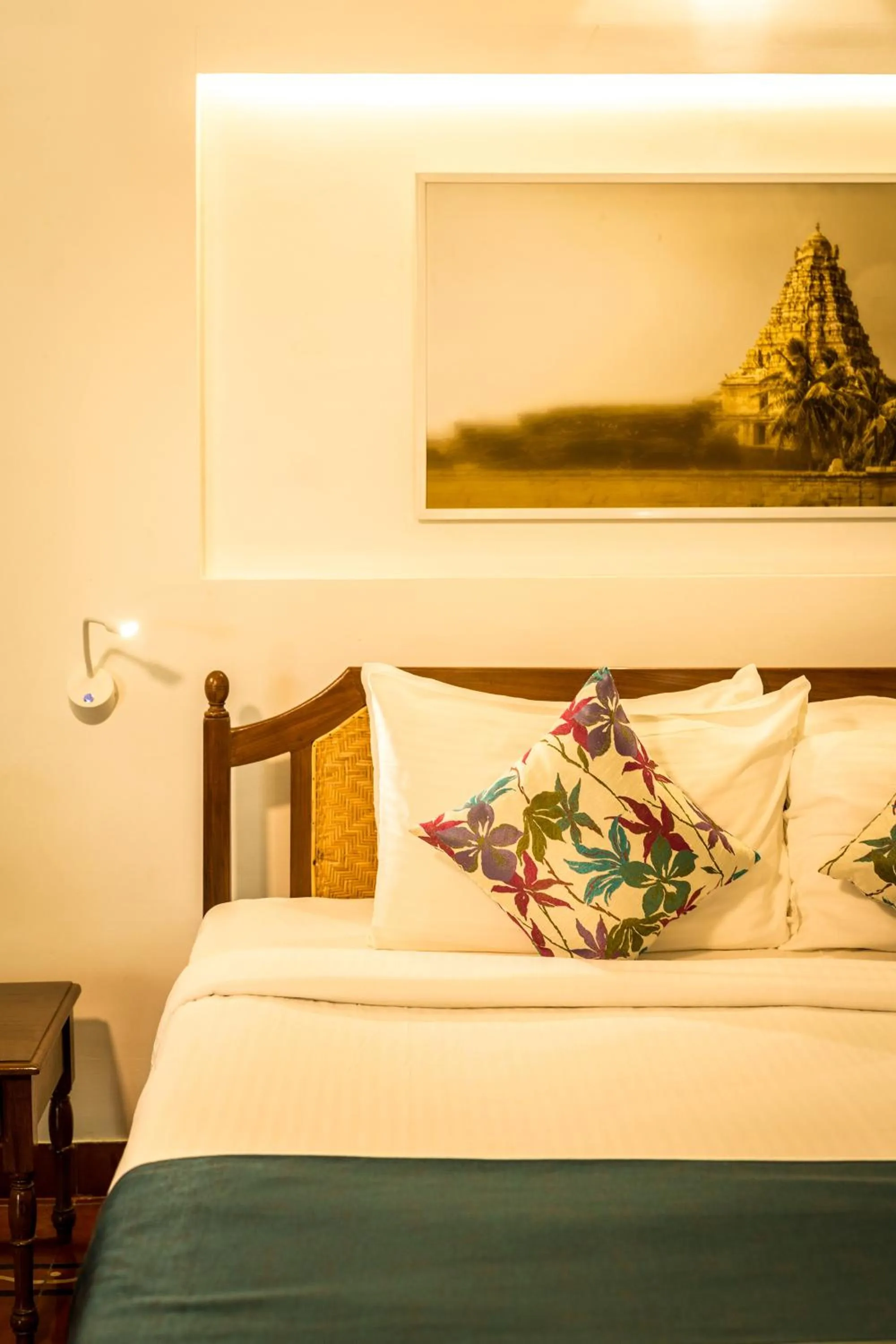 Bed in Mantra Koodam Kumbakonam - A CGH Earth Experience