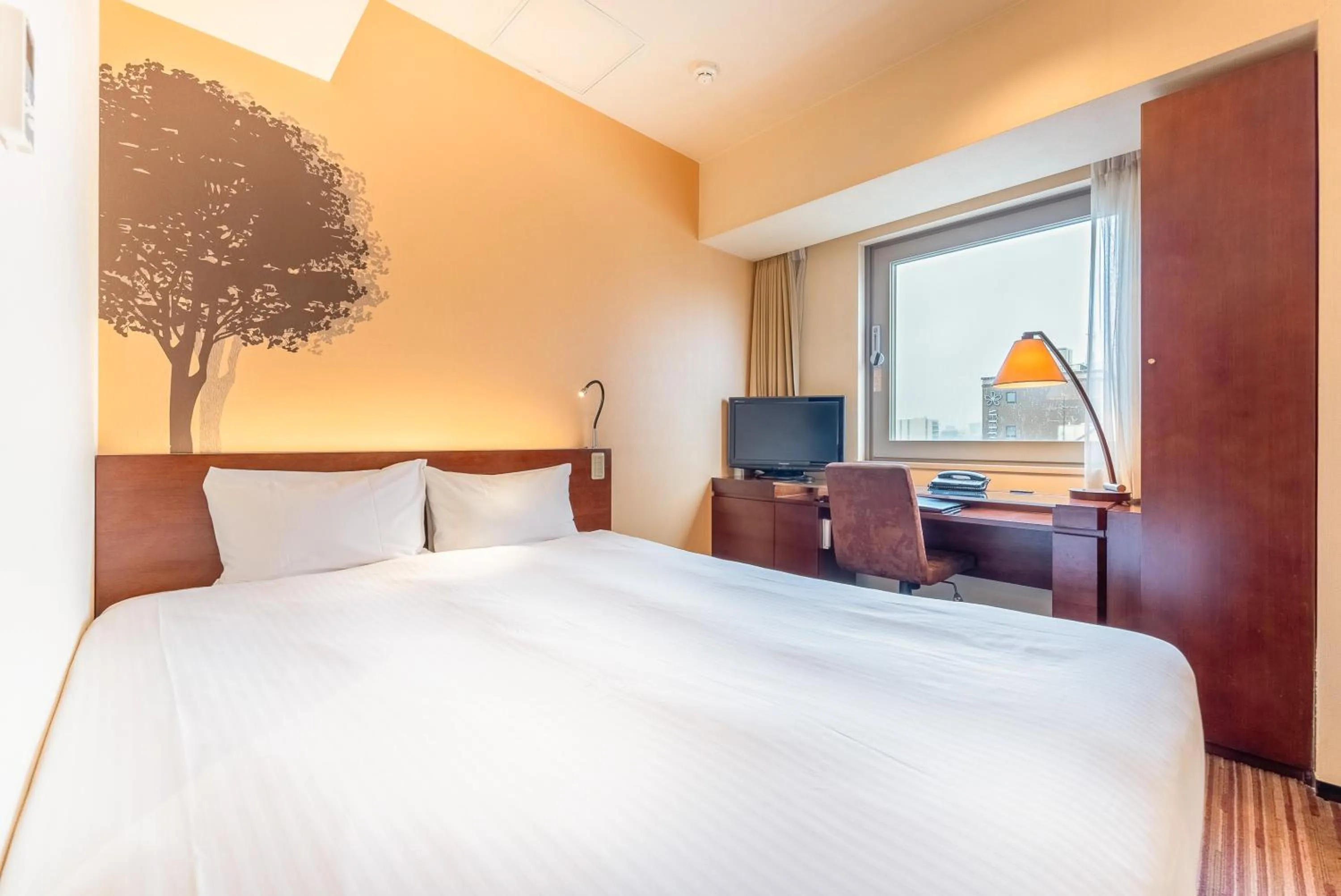 Bed in Hotel Keihan Asakusa