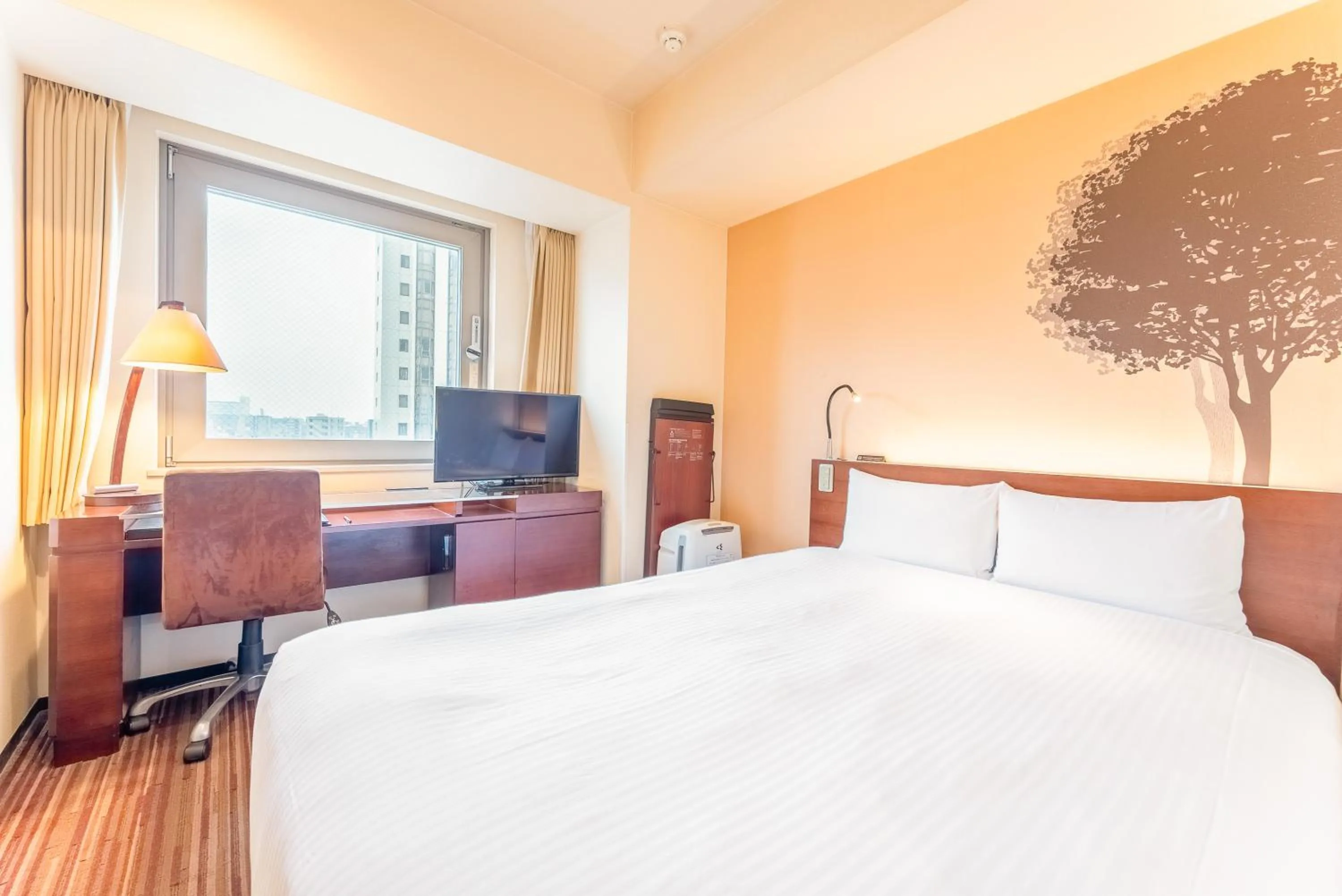 Bed in Hotel Keihan Asakusa