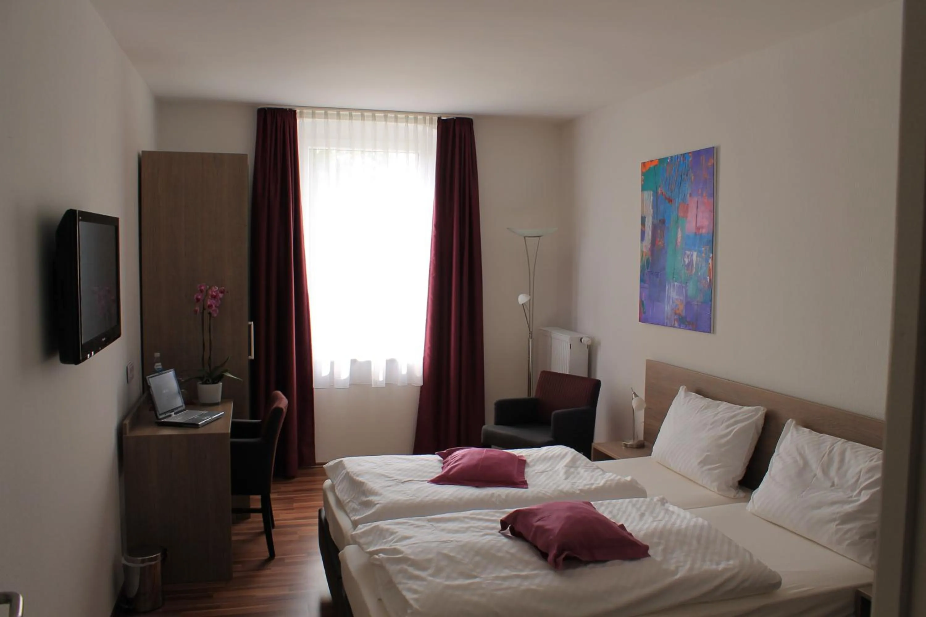 Bed in RheinHotel ARTE