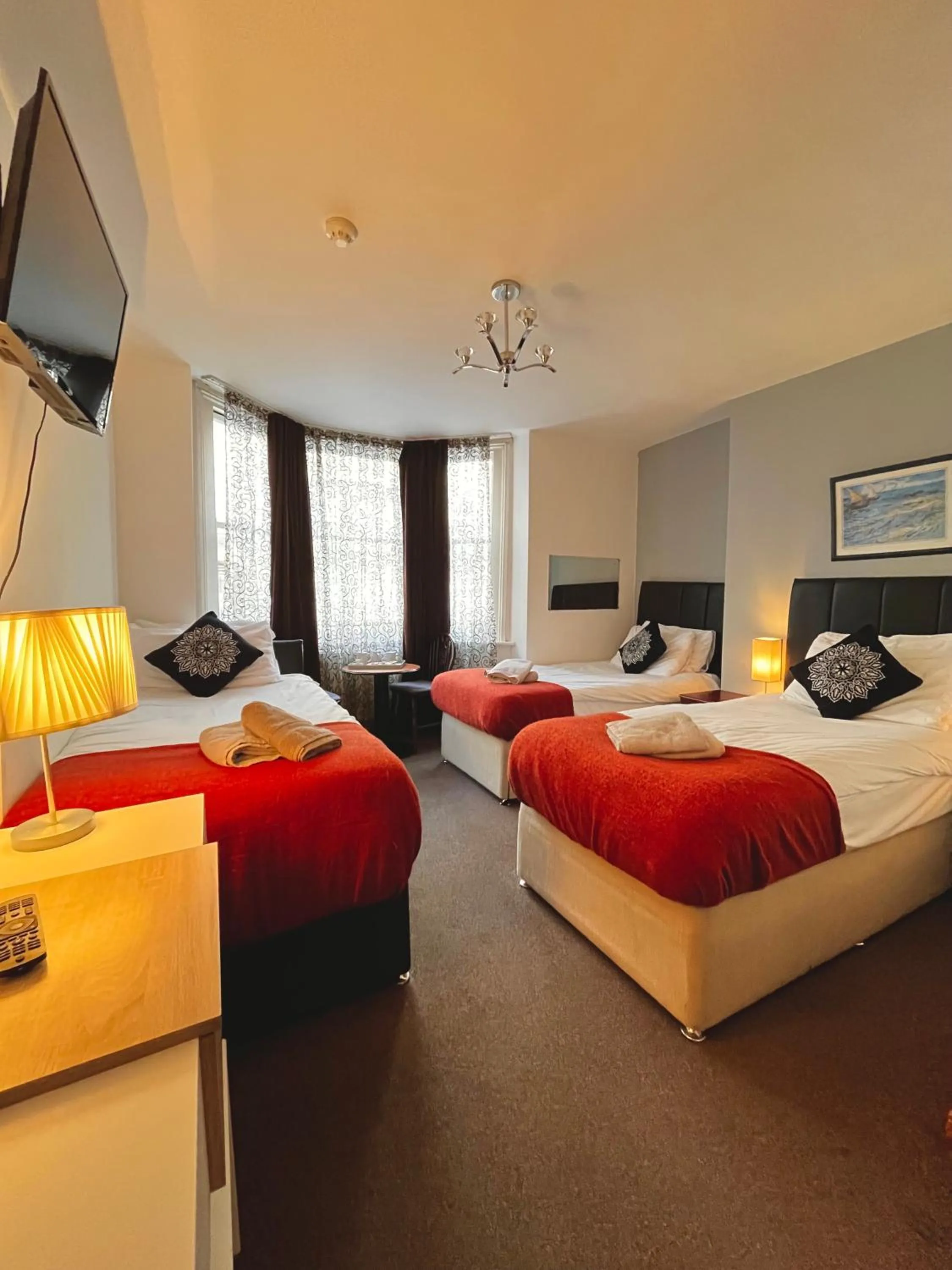 Bed in Old Palace Guest House