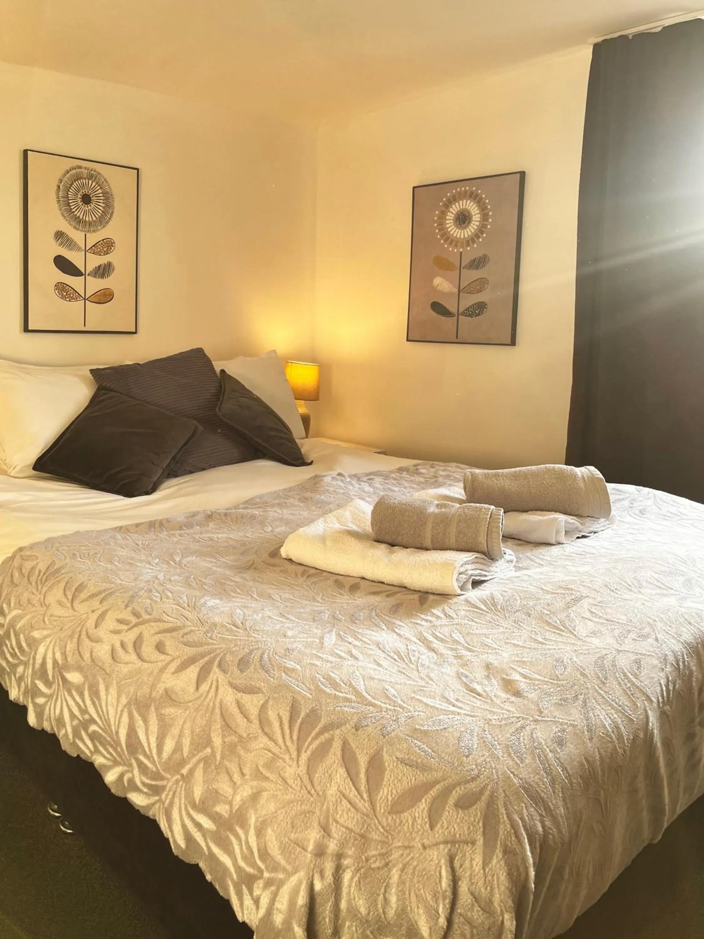 Bed in Old Palace Guest House