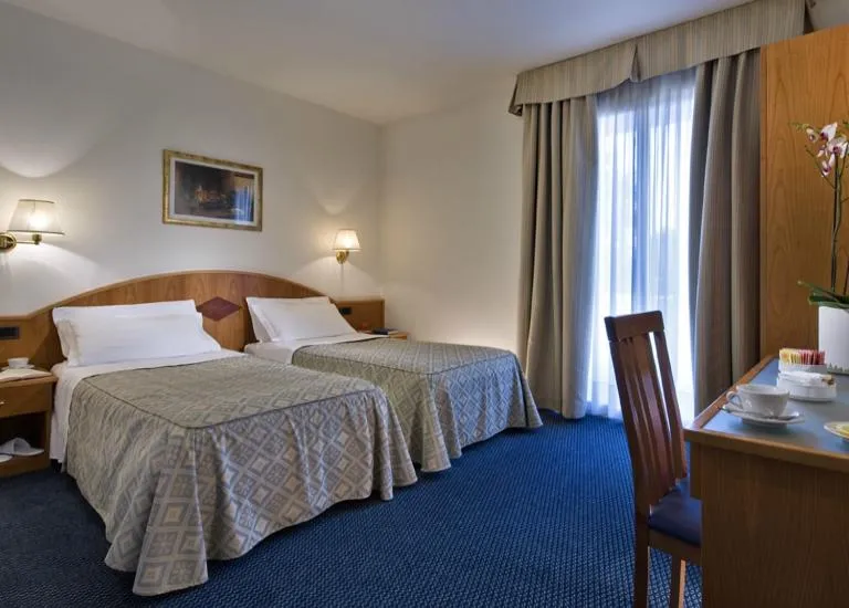 Day, Bed in Hotel Lo Zodiaco