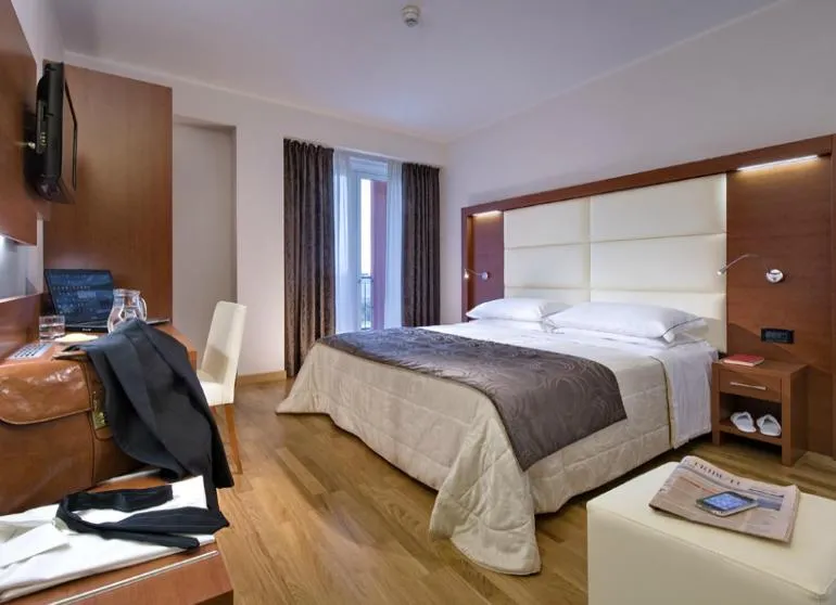 Day, Bed in Hotel Lo Zodiaco