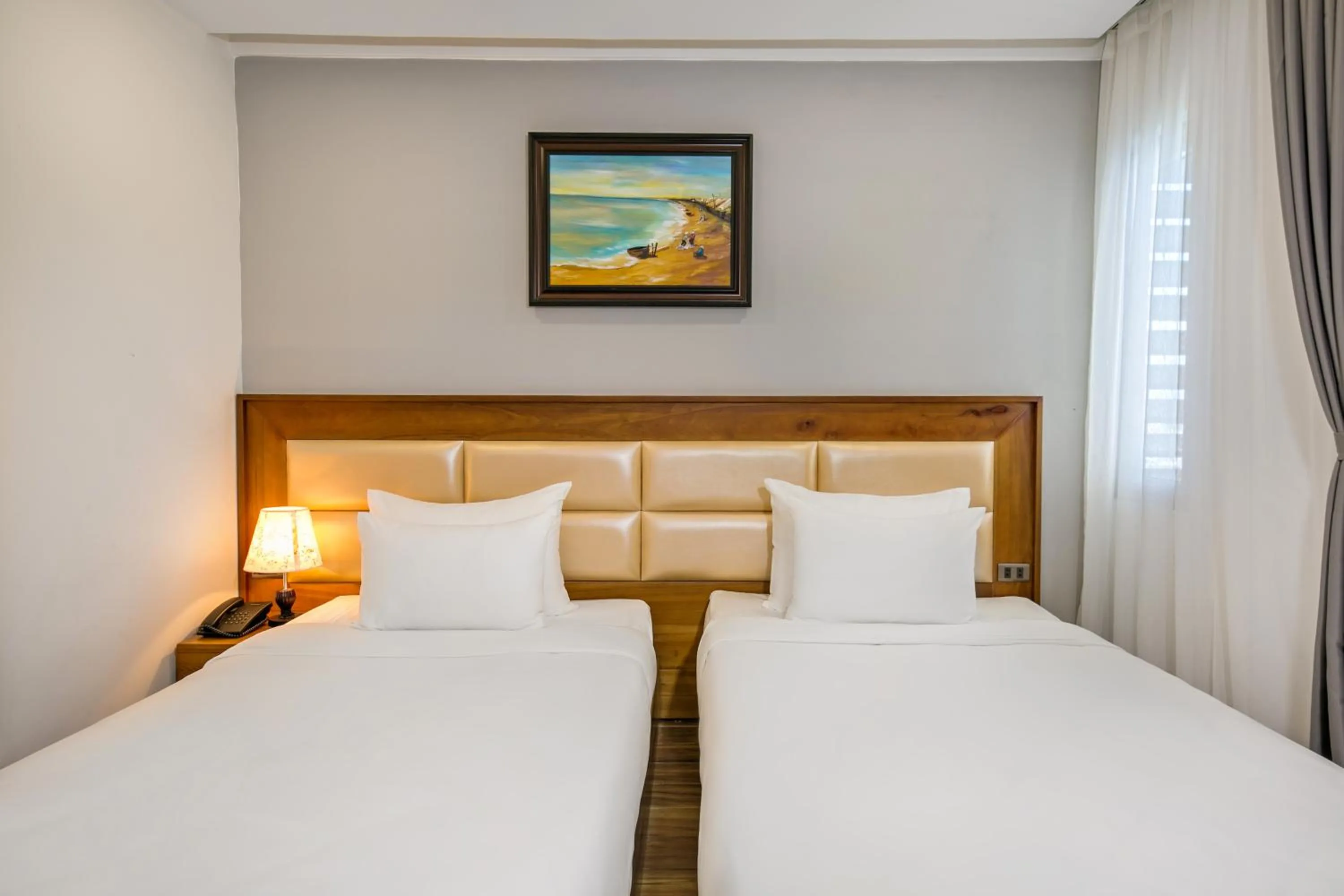 Photo of the whole room in Alisia Beach Hotel Da Nang
