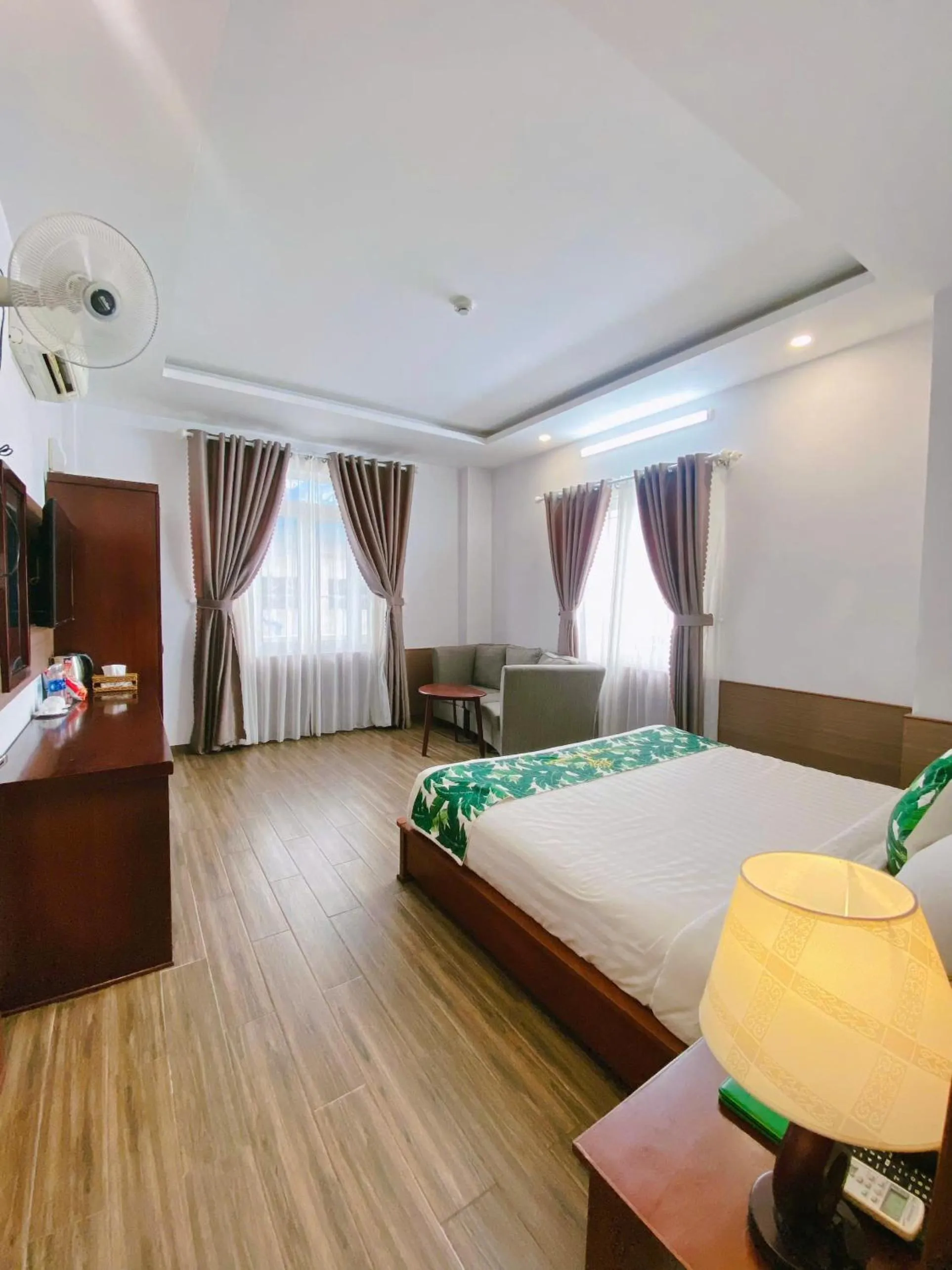 Bed in Flora Quy Nhon Hotel