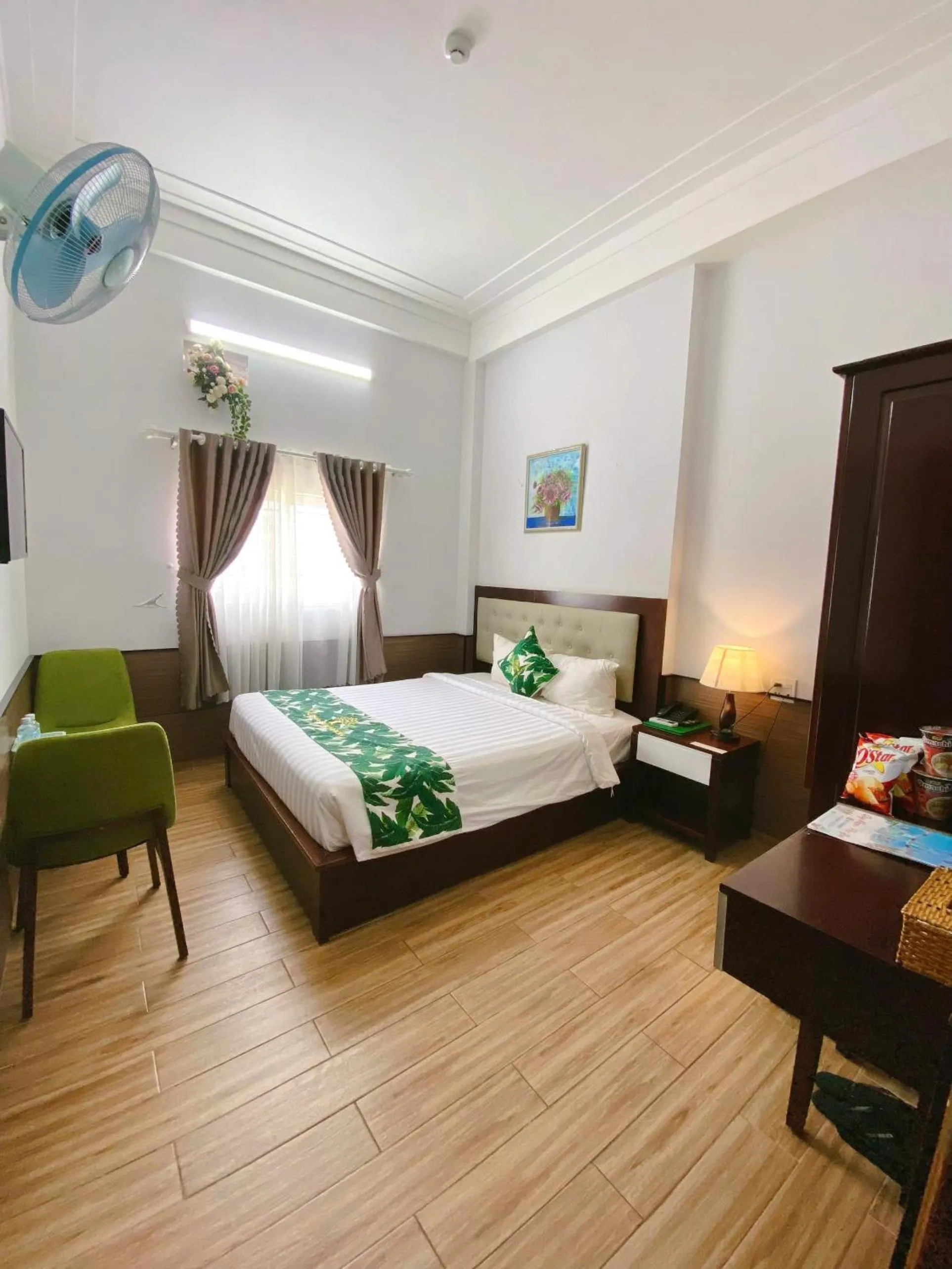 Bed in Flora Quy Nhon Hotel