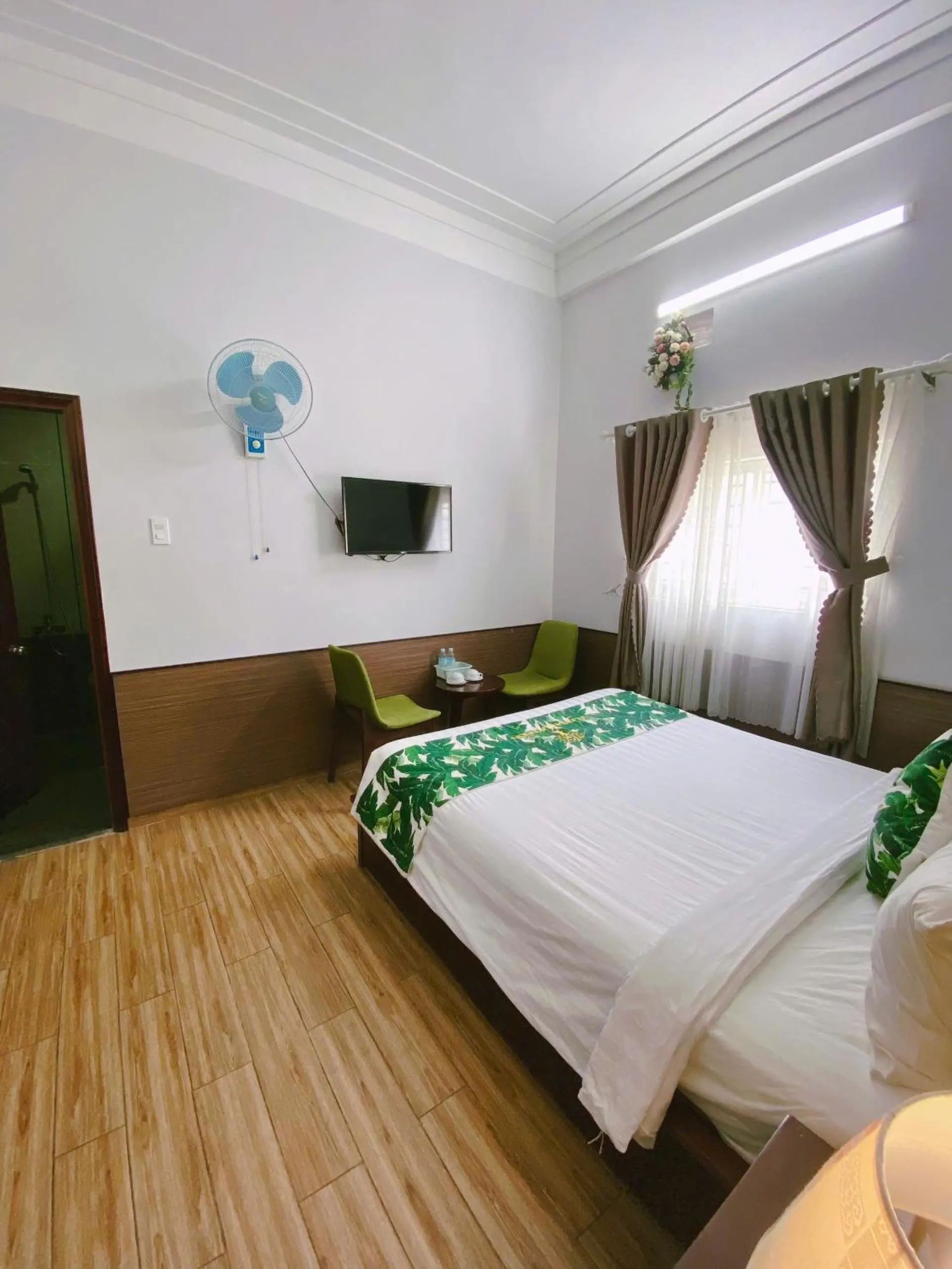 Bed in Flora Quy Nhon Hotel