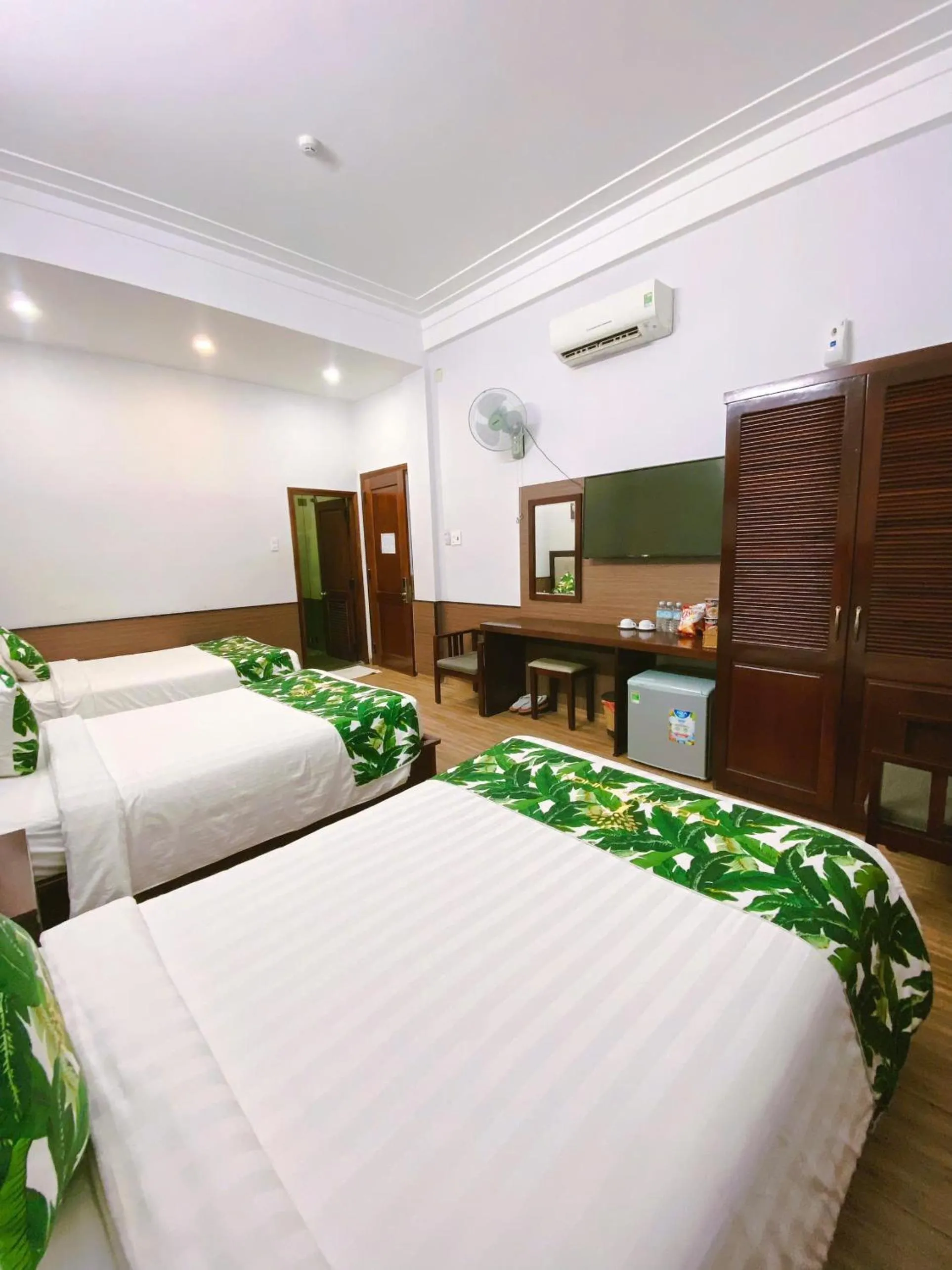 Bed in Flora Quy Nhon Hotel