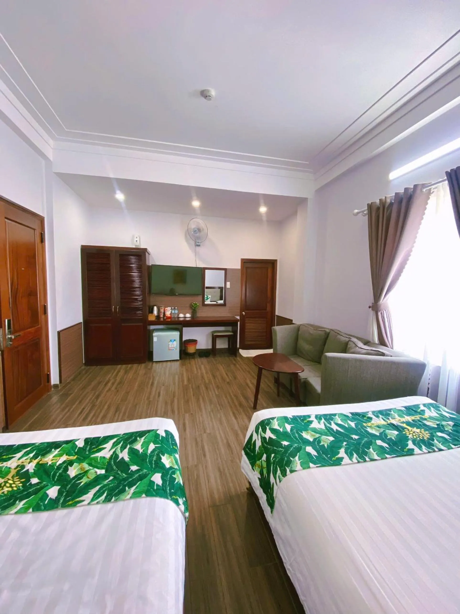 Bed in Flora Quy Nhon Hotel