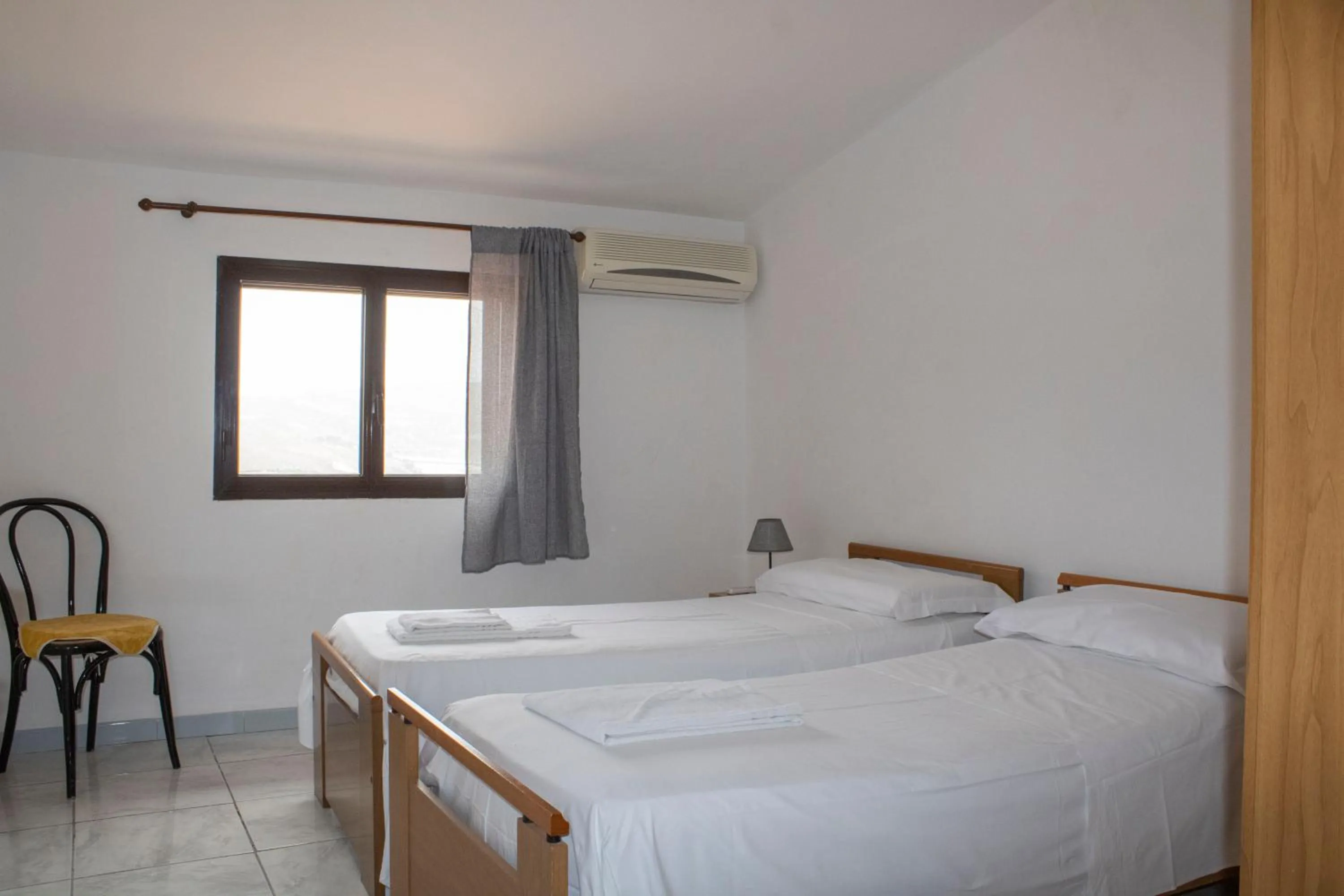 Bedroom, Bed in Agriturismo Bellajo - Ville Rustiche con Piscina