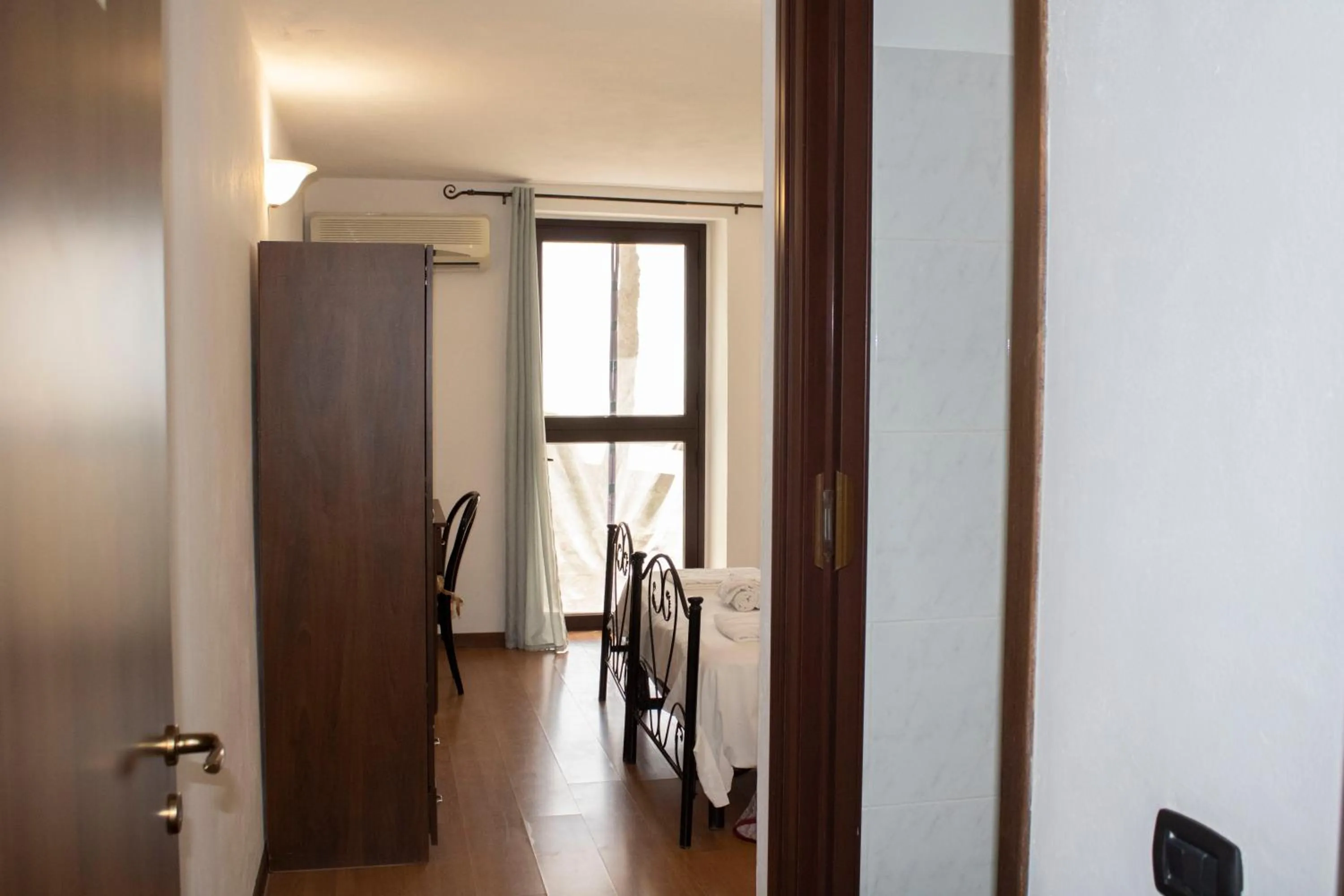 Bedroom in Agriturismo Bellajo - Ville Rustiche con Piscina