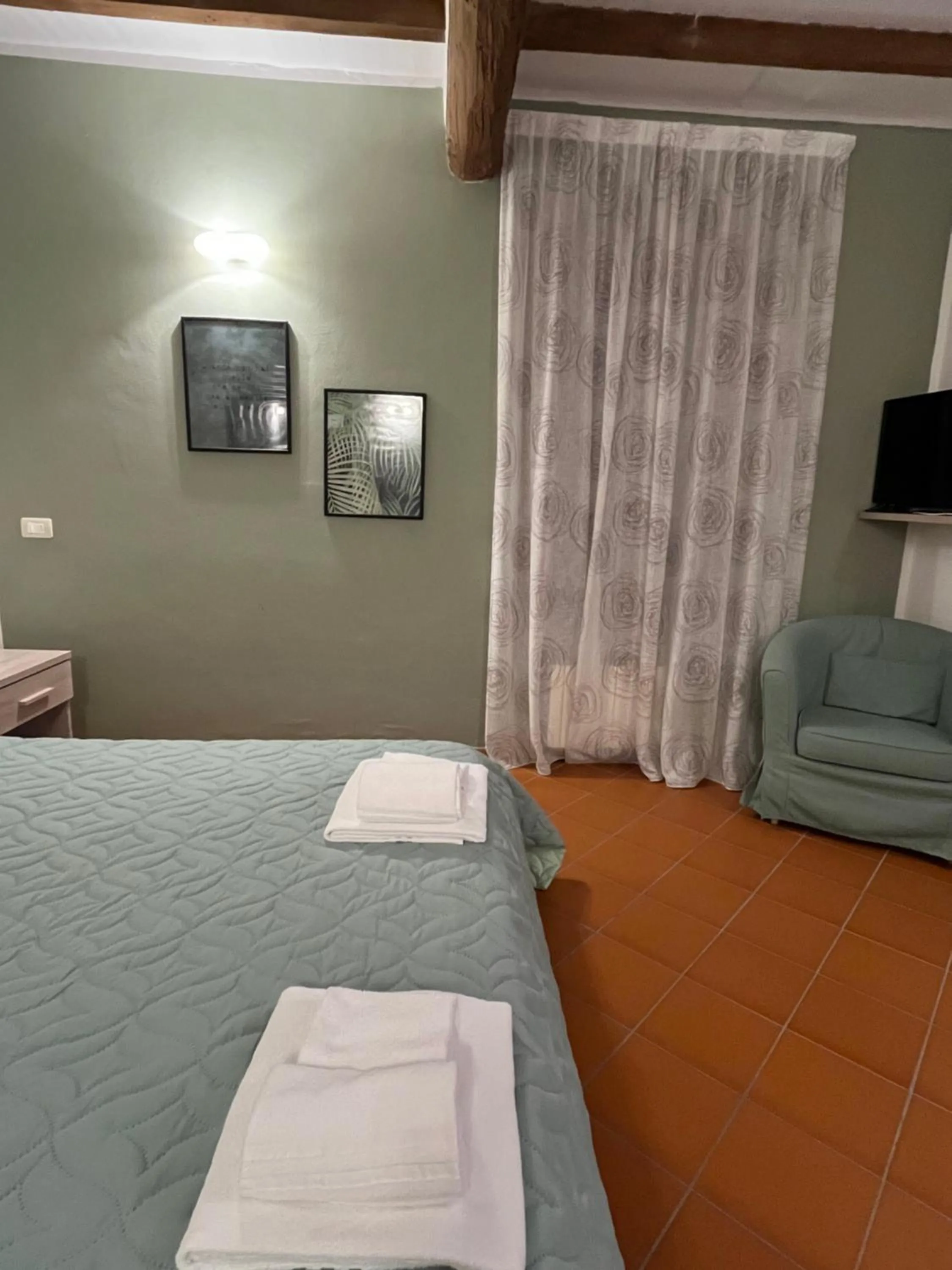 Photo of the whole room, Bed in Villaggio Della Salute Più