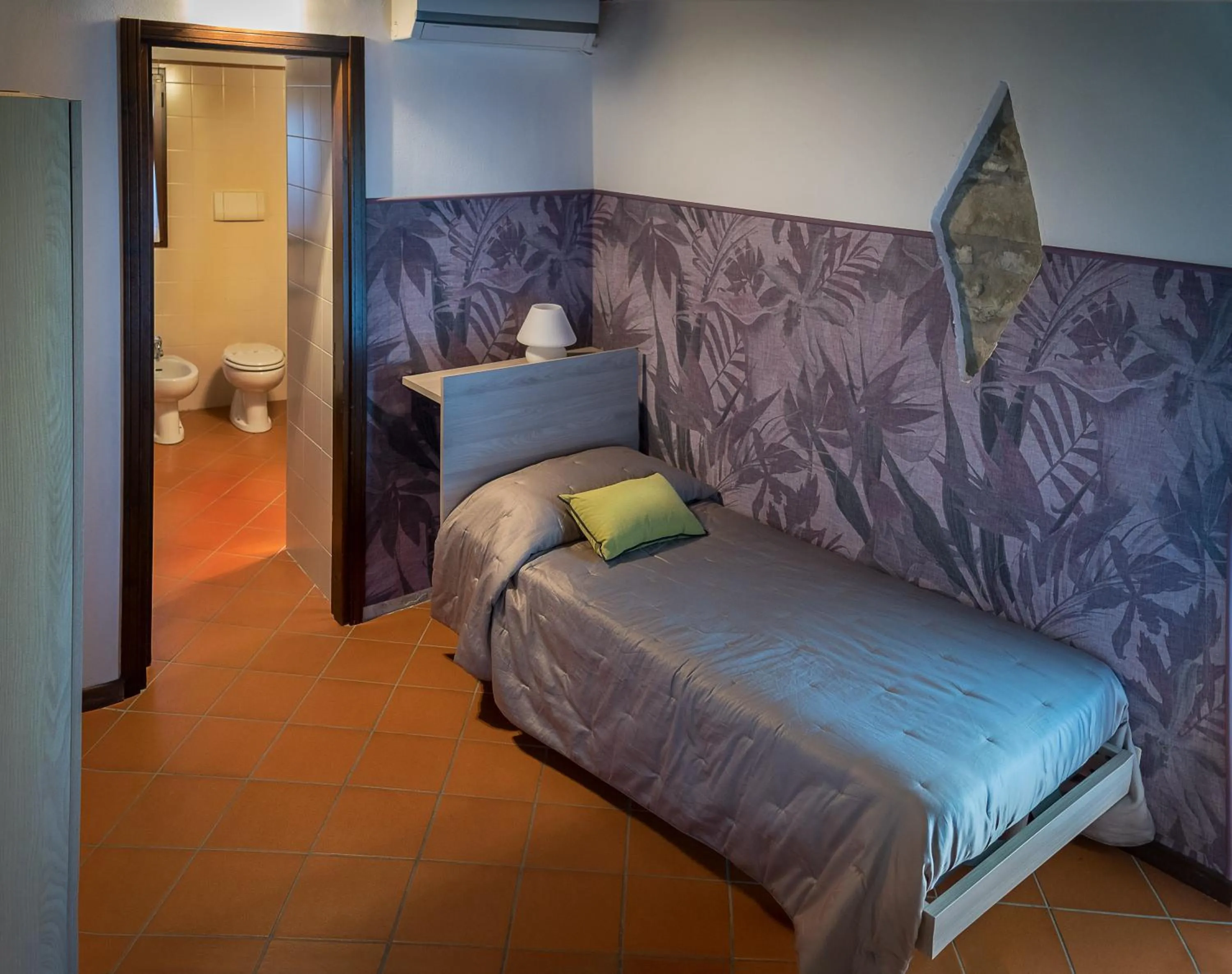 Photo of the whole room, Bed in Villaggio Della Salute Più
