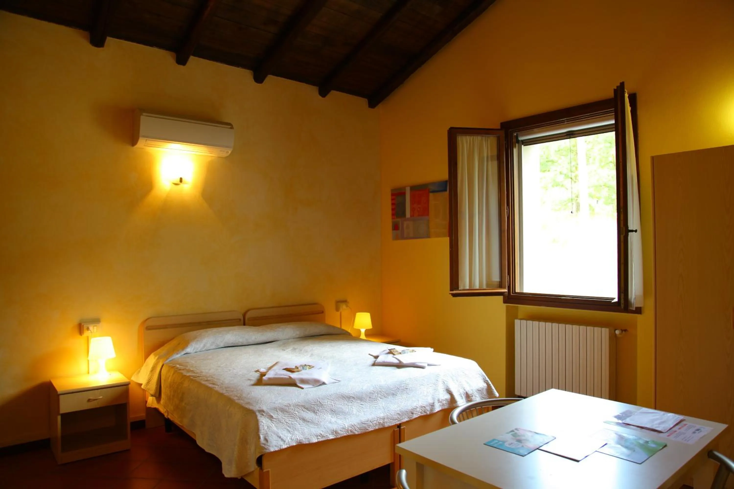 Photo of the whole room, Bed in Villaggio Della Salute Più
